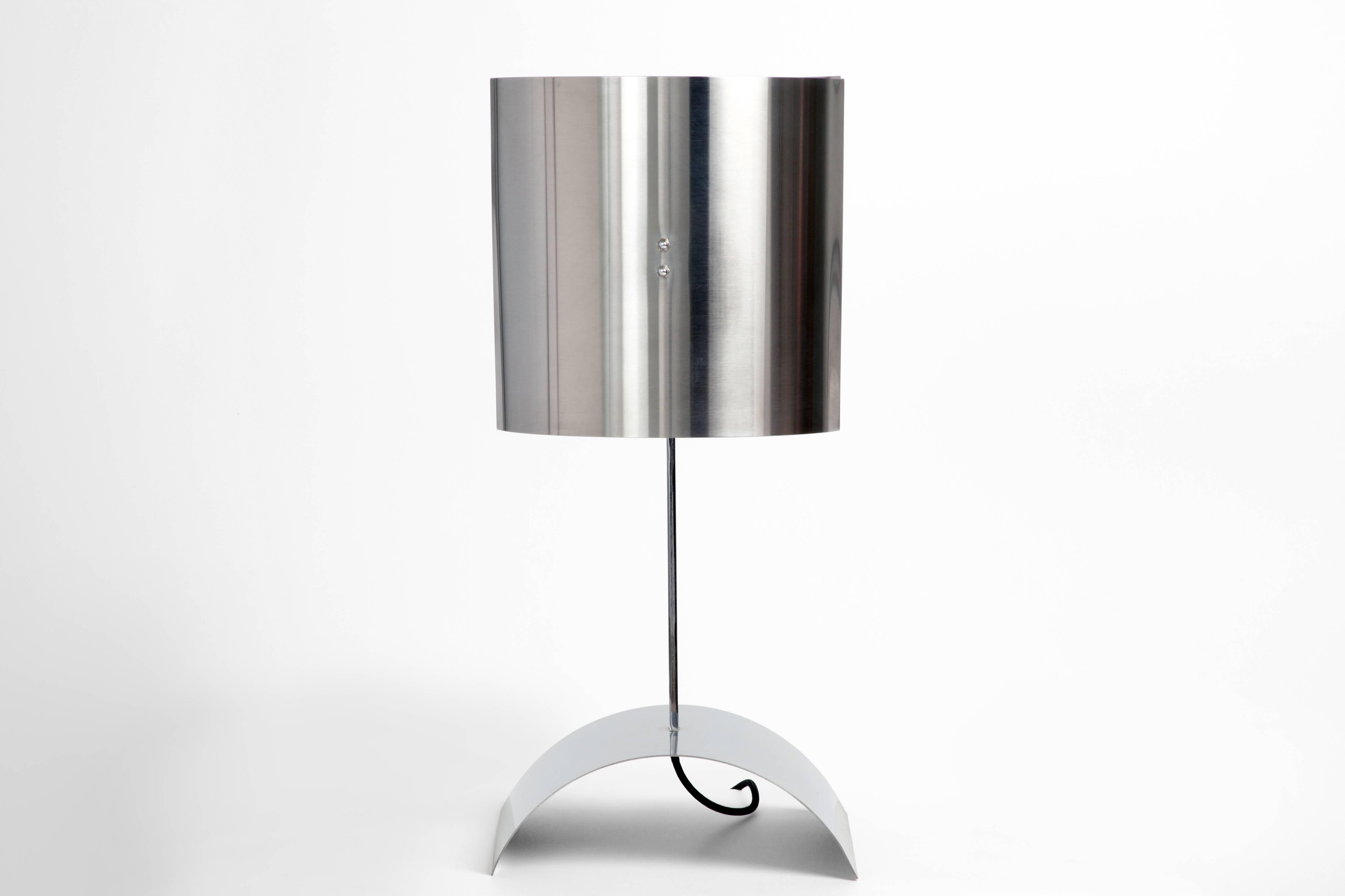 Stainless steel Modernist geometric table lamp by Jean Pierre Bouvier.

Wired to US standards.