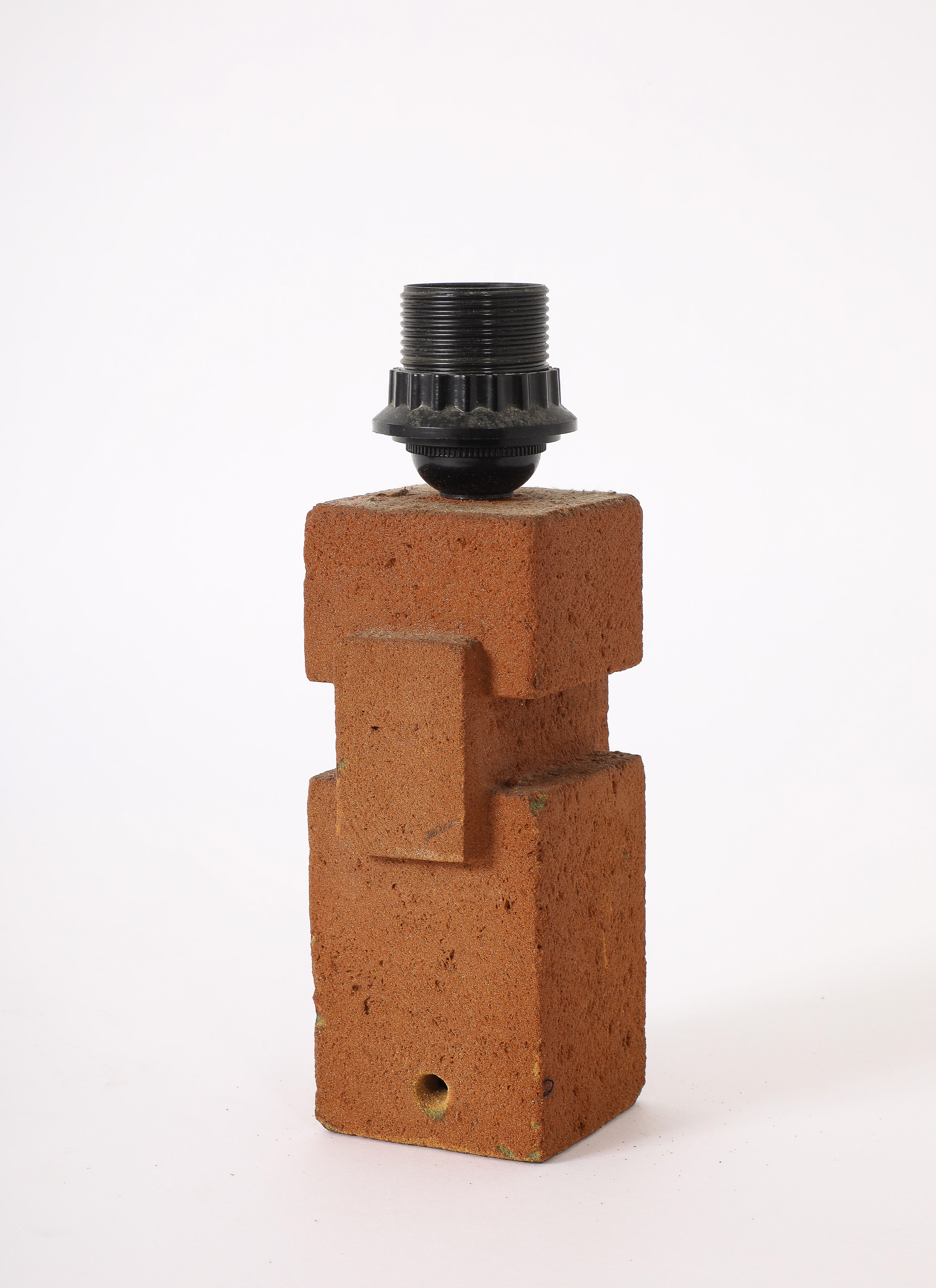 Brown Earthenware lamp in the cubist manner.

Base Only 8X3X3
