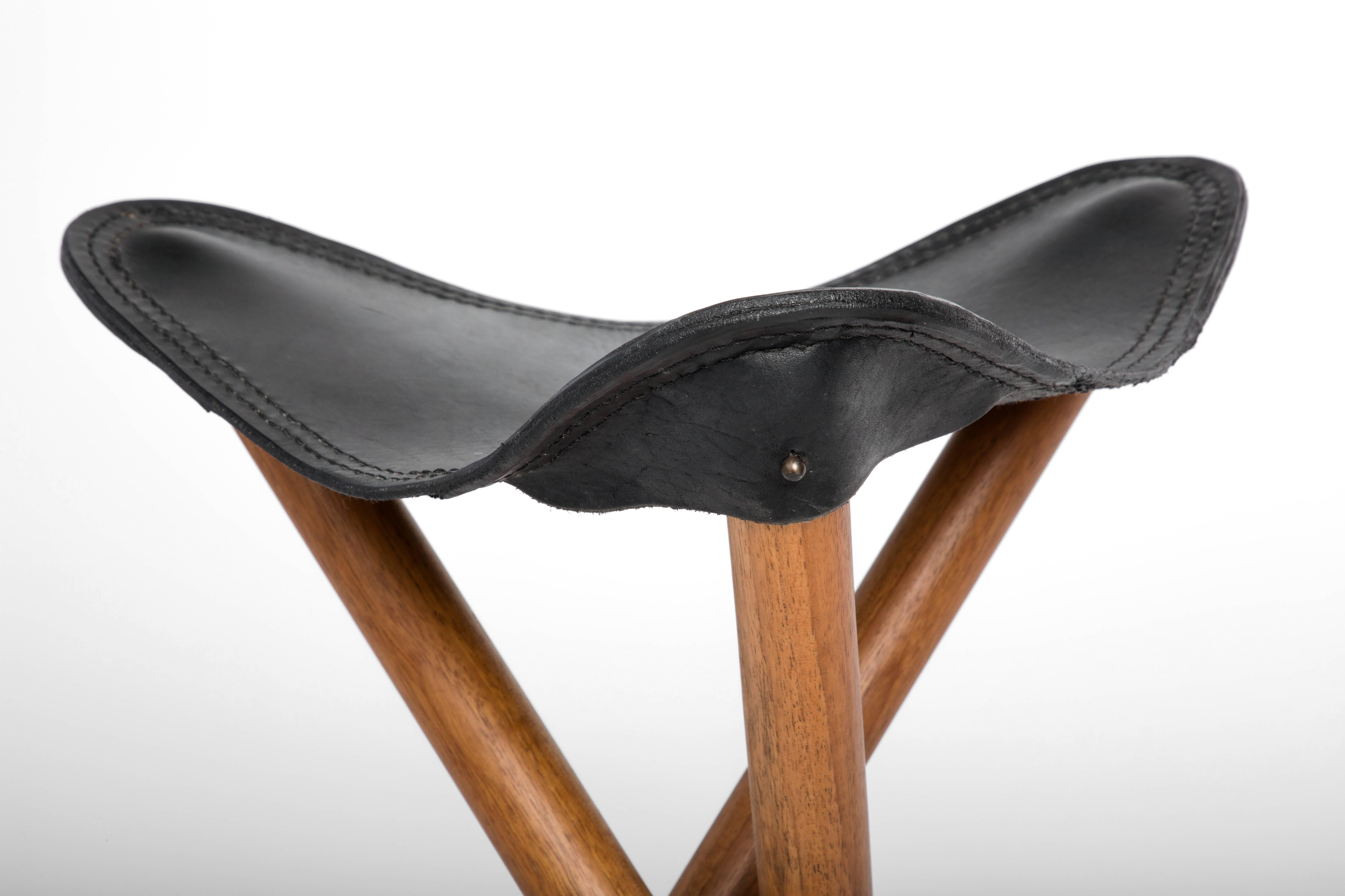 Hand-Carved Sap Wood and Saddle Leather Campaign Stool, Erik Gustafson