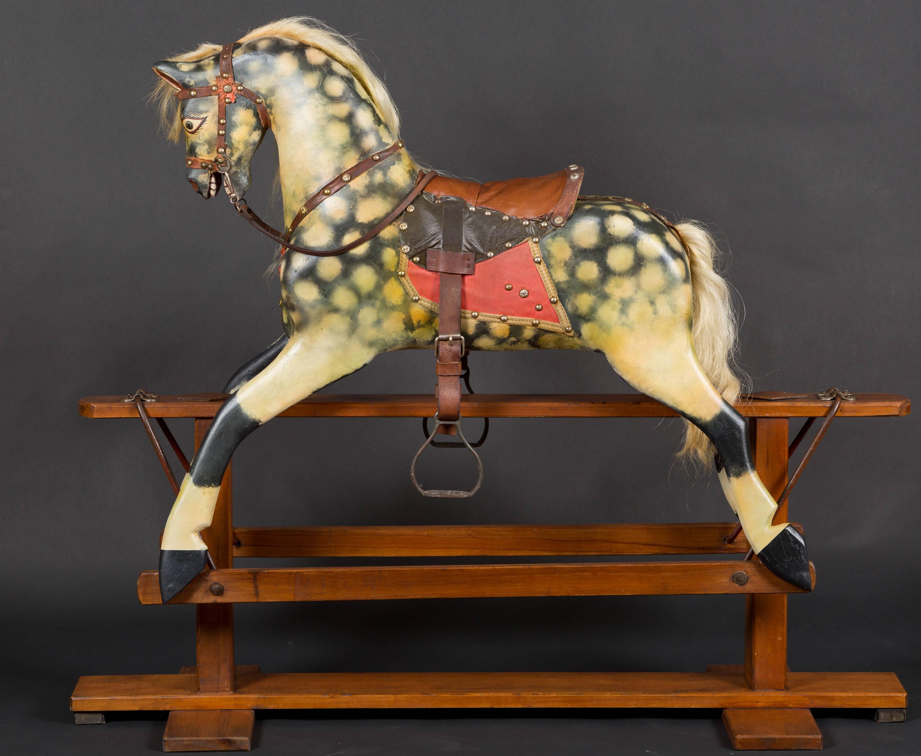 Victorian rocking horse, dapple grey with flowing mane and tail. Original saddle and bridle, circa 1880.