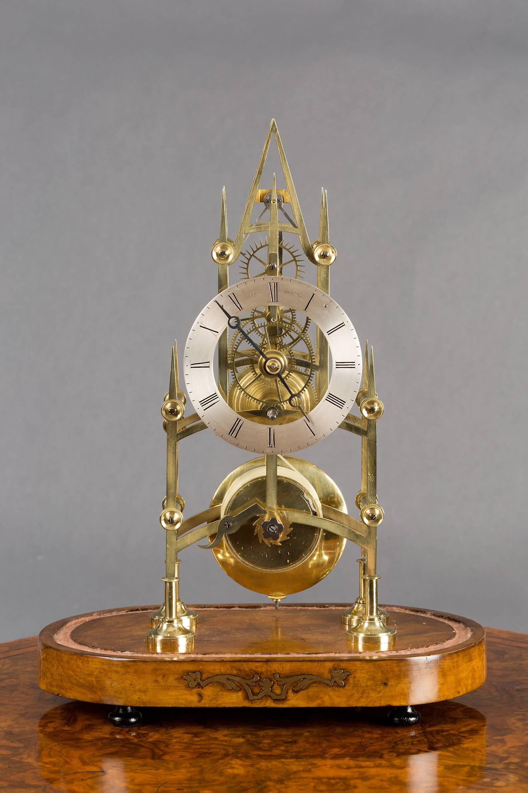 Fine early Victorian brass skeleton clock.

Steeple shaped thick brass plates with six tapered, ringed pillars. Finely engraved ringed turnings. 

Wheelwork of the highest quality all with five and six spoke wheel crossings. 

Eight day fusee