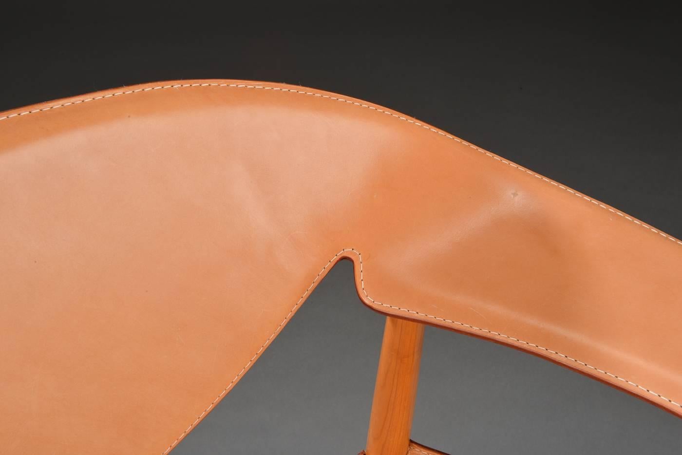 Lounge chair, model Metropolitan Chair. Cherry frame upholstered in harness leather. Designed in 1959. Presented at the Copenhagen Cabinetmaker Guild Exhibition at Kunstindustrimuseet in 1959. Produced by Søren Horns eftf. Snedkermester Niels Roth