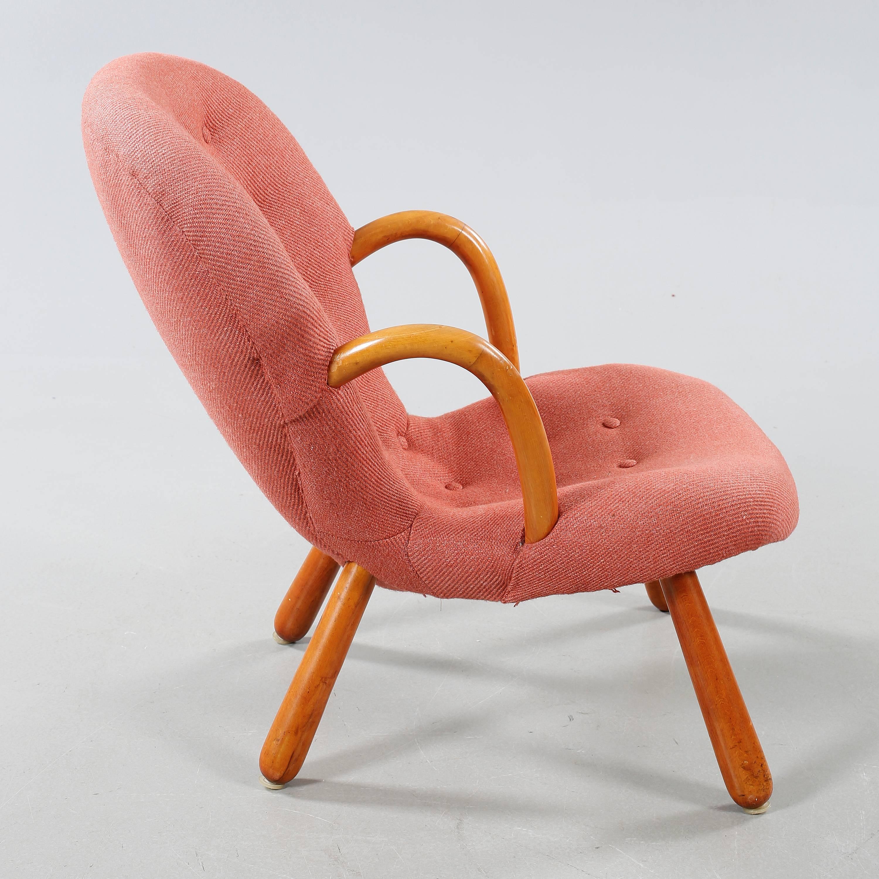 Philip Arctander clam chair in original upholstery.