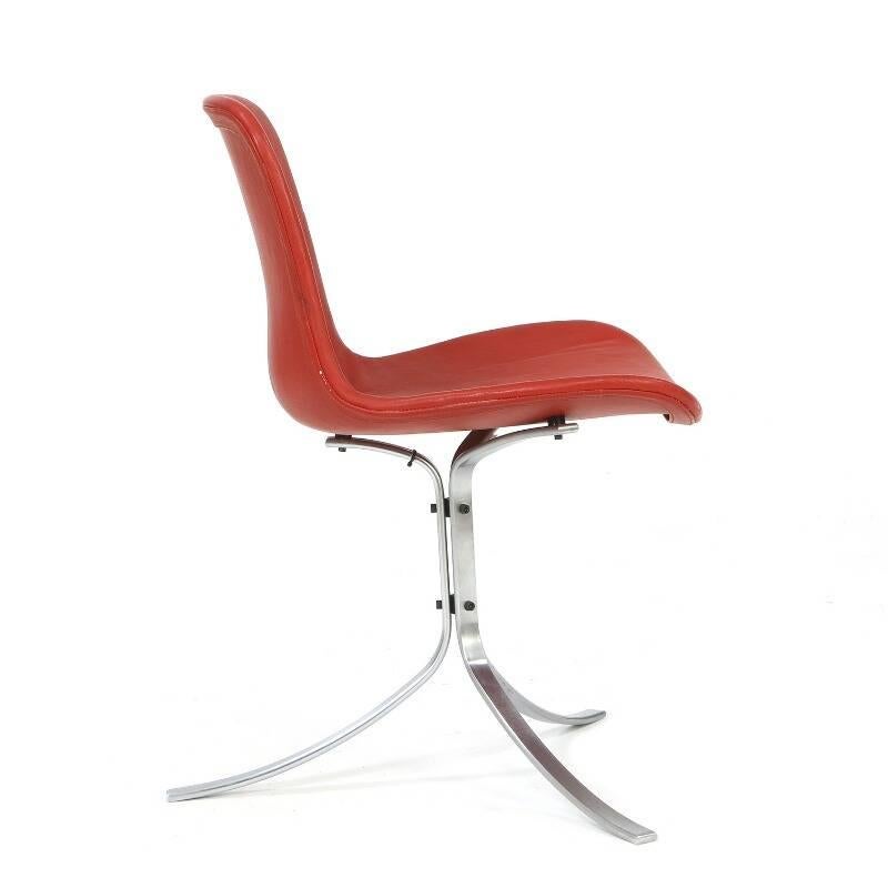 Chair with frame of mat chromed steel. Upholstered with red leather. Manufactured by Fritz Hansen.