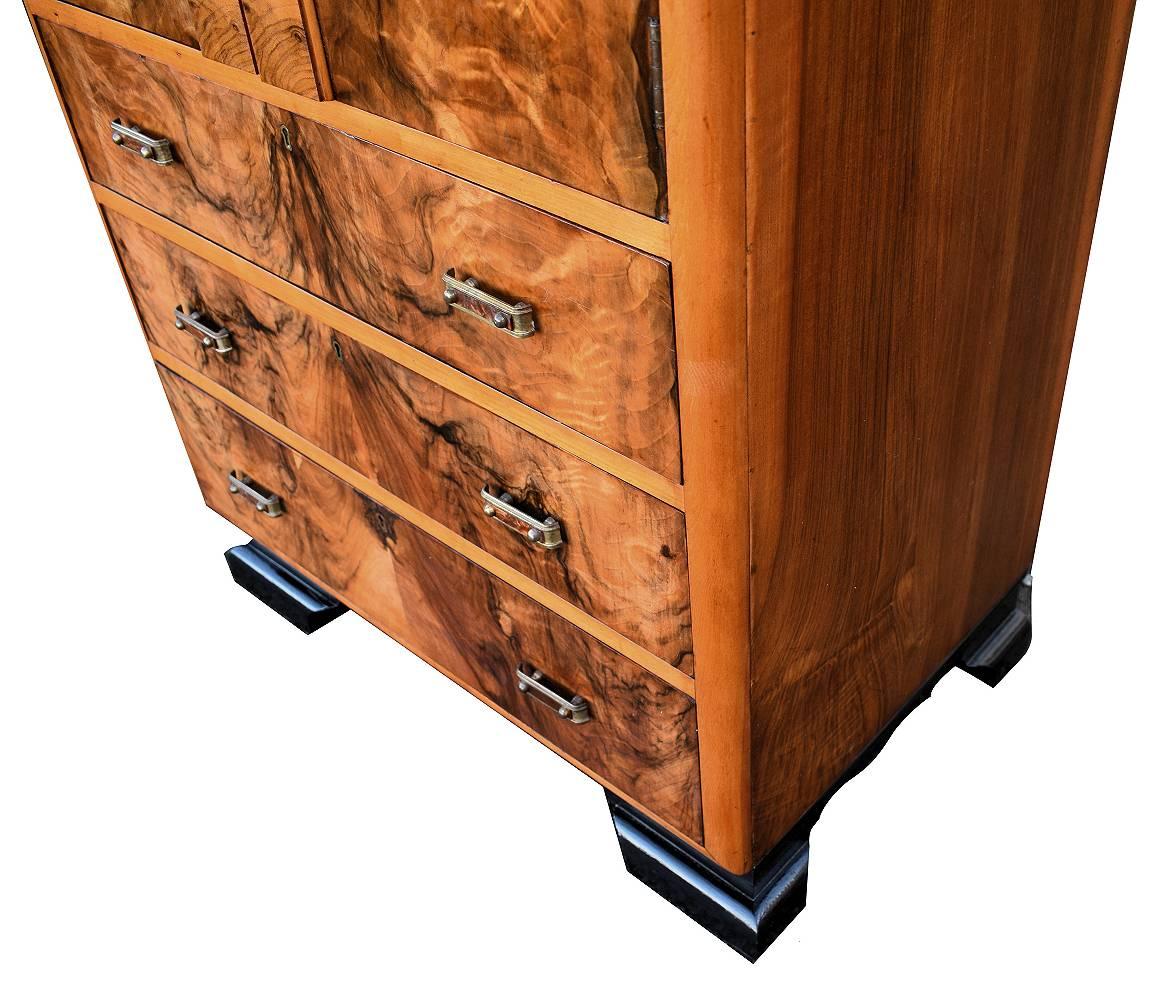 For your consideration we have delighted to be able to offer you this stylish example of an Art Deco 1930's figured walnut cabinet / chest of drawers in amazing condition for its age . The cabinet features a wonderful cloud design on the front and a