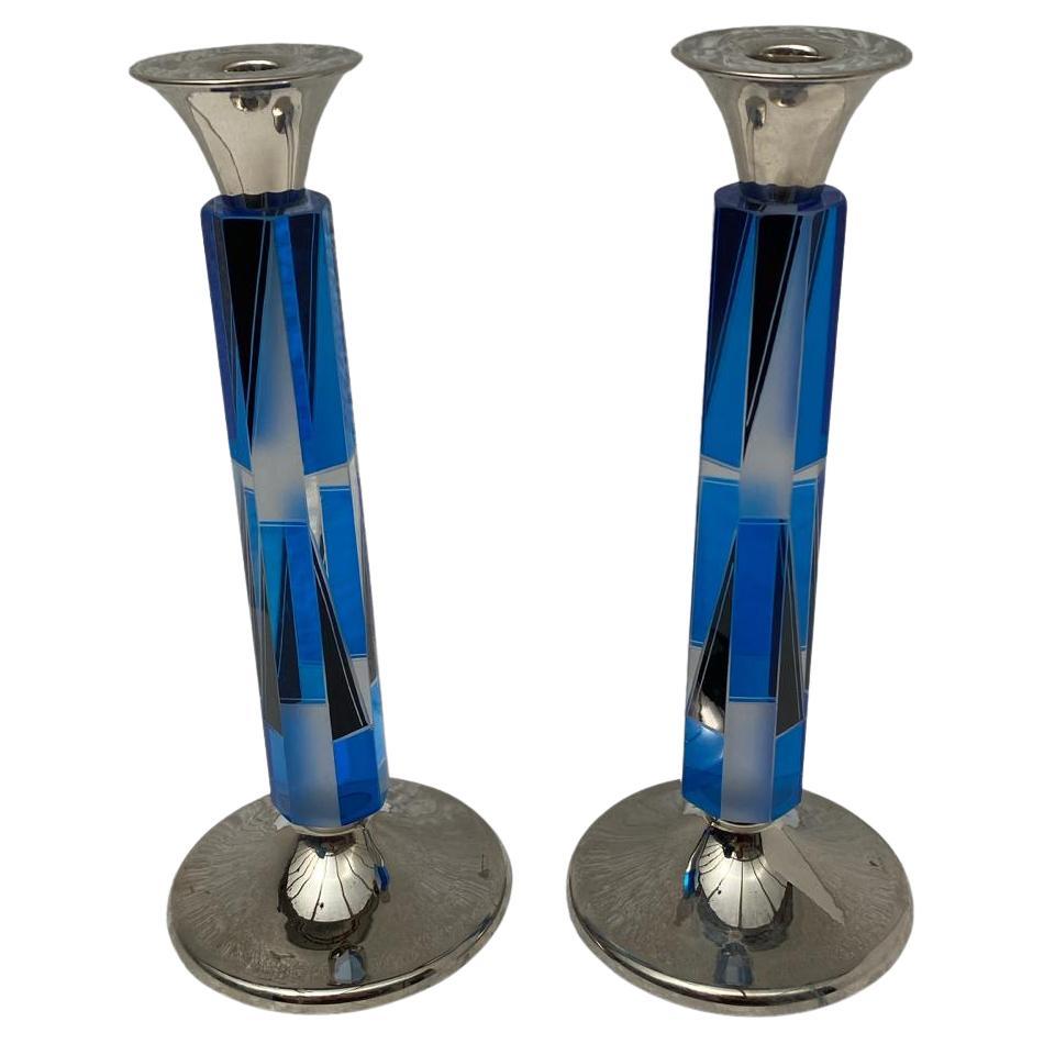 Superbly stylish and good sized pair of matching 1930s Art Deco candlesticks. Hallmarked nickel-silver bases and with tall glass columns. Lovely condition and one Art Deco admirers will appreciate. Felt bases have been added to the bottom of the