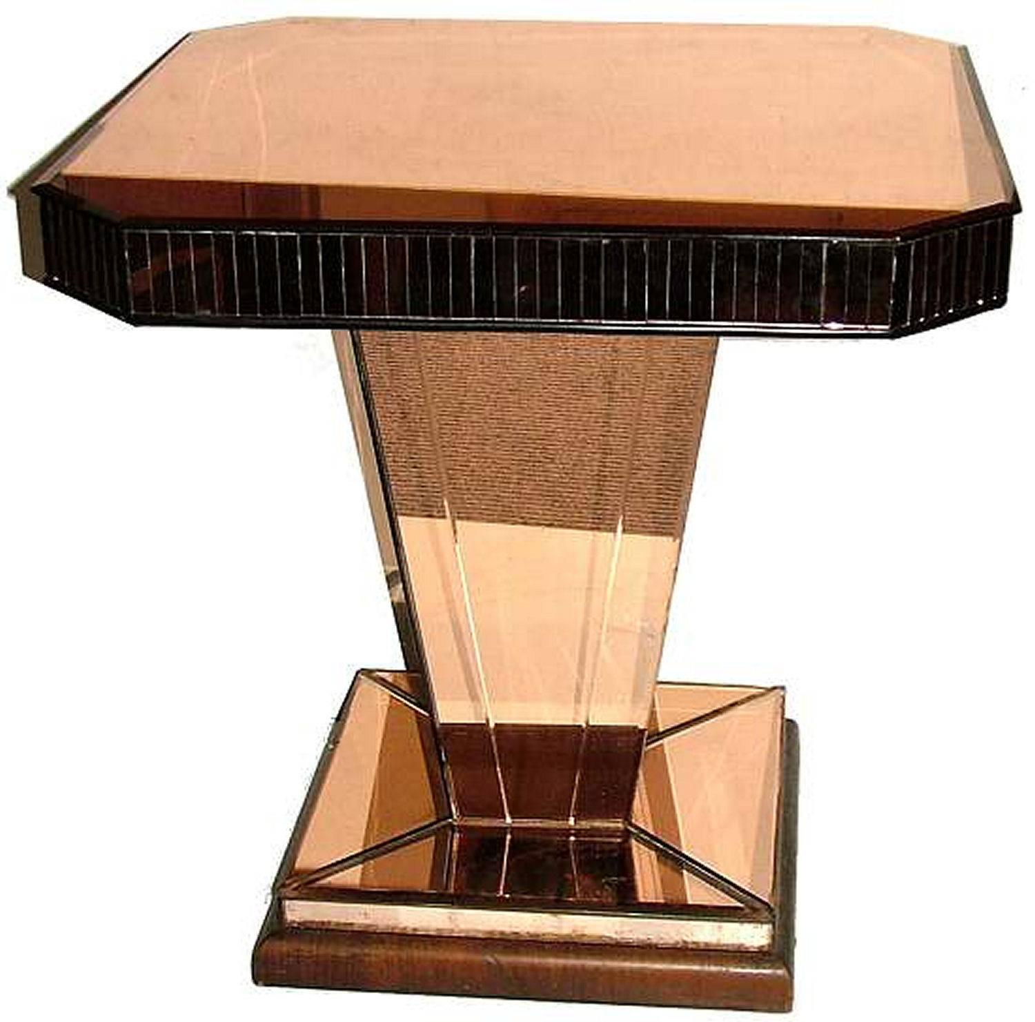 Absolutely stunning 1930s Art Deco all peach mirror glass centre table. This fabulous, glamorous table features thick cut bevelled peach coloured glass to all edges all resting on a walnut feather band plinth. It has a fabulous conical shaped stem