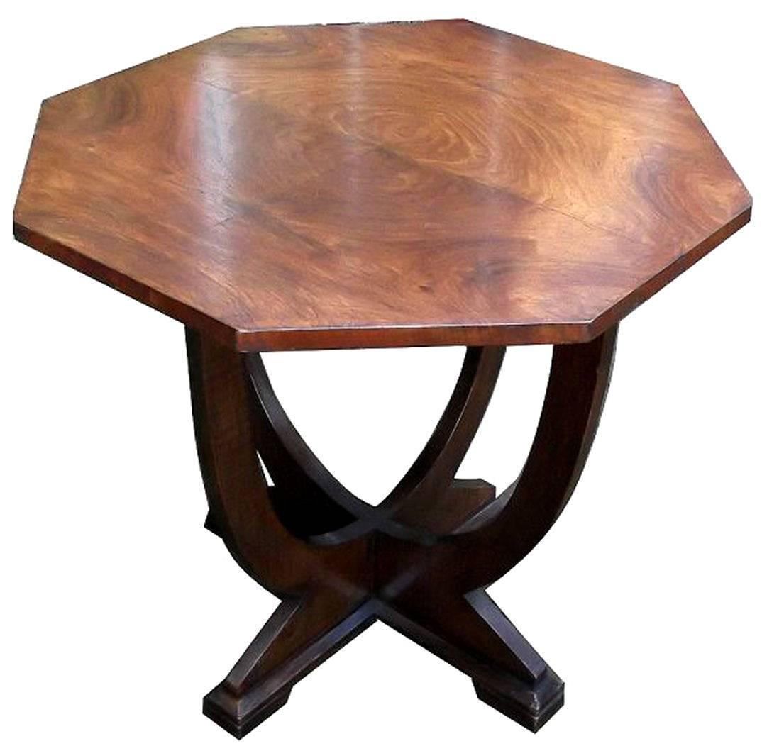 Fabulous and original 1930s Art Deco geometric occasional table. This table is ideal for modern use either as a coffee table or center table and used as a focal point to a room. The veneers are lightly figured walnut with ebonized stretcher base.