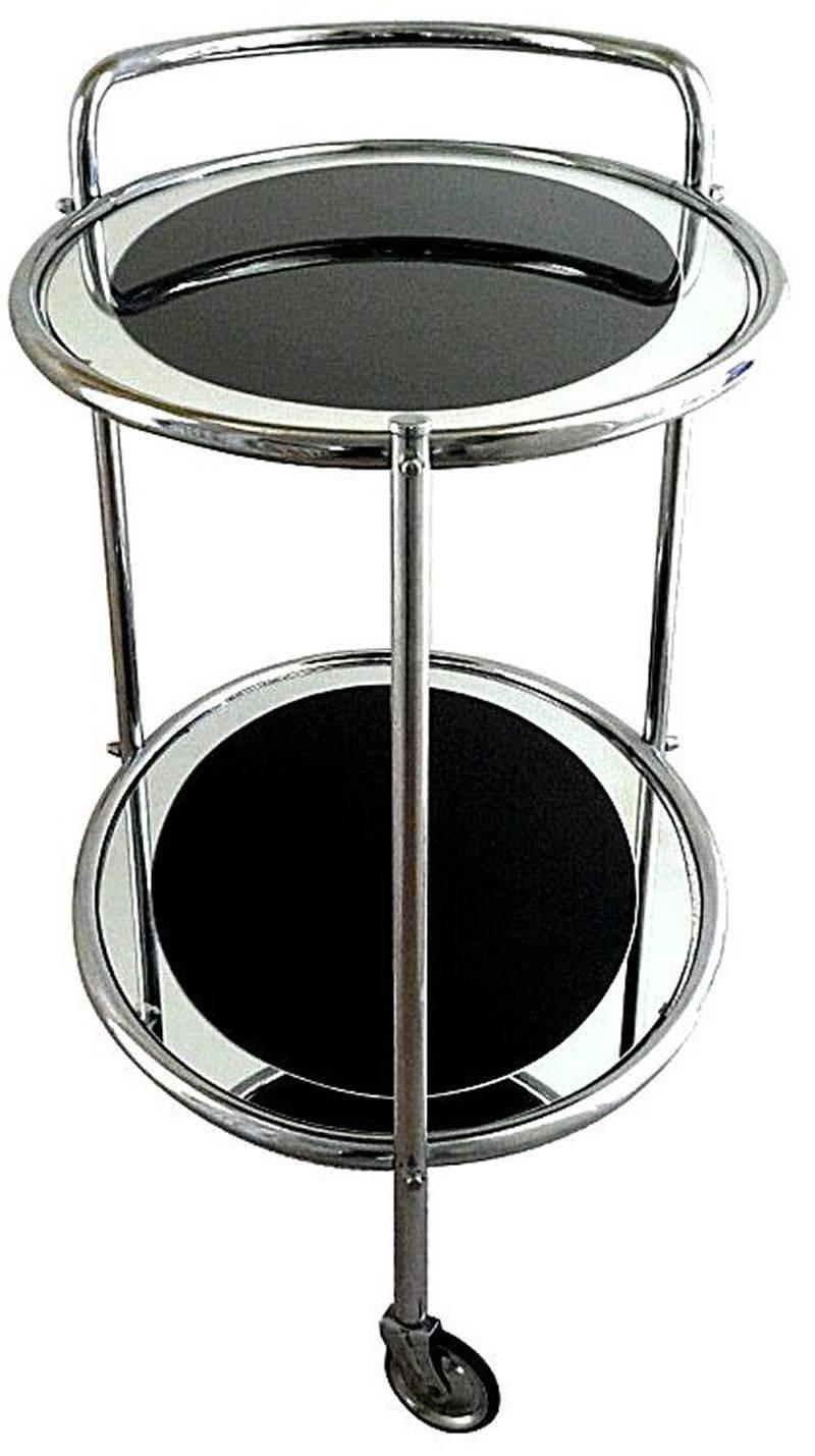 Art Deco modernist hostess trolley.
Now this really is a fabulous hostess cart! Original 1930s Art Deco chrome two tier trolley, with black and mirrored edged glass, very glam! All totally original and in great condition. These are fab for