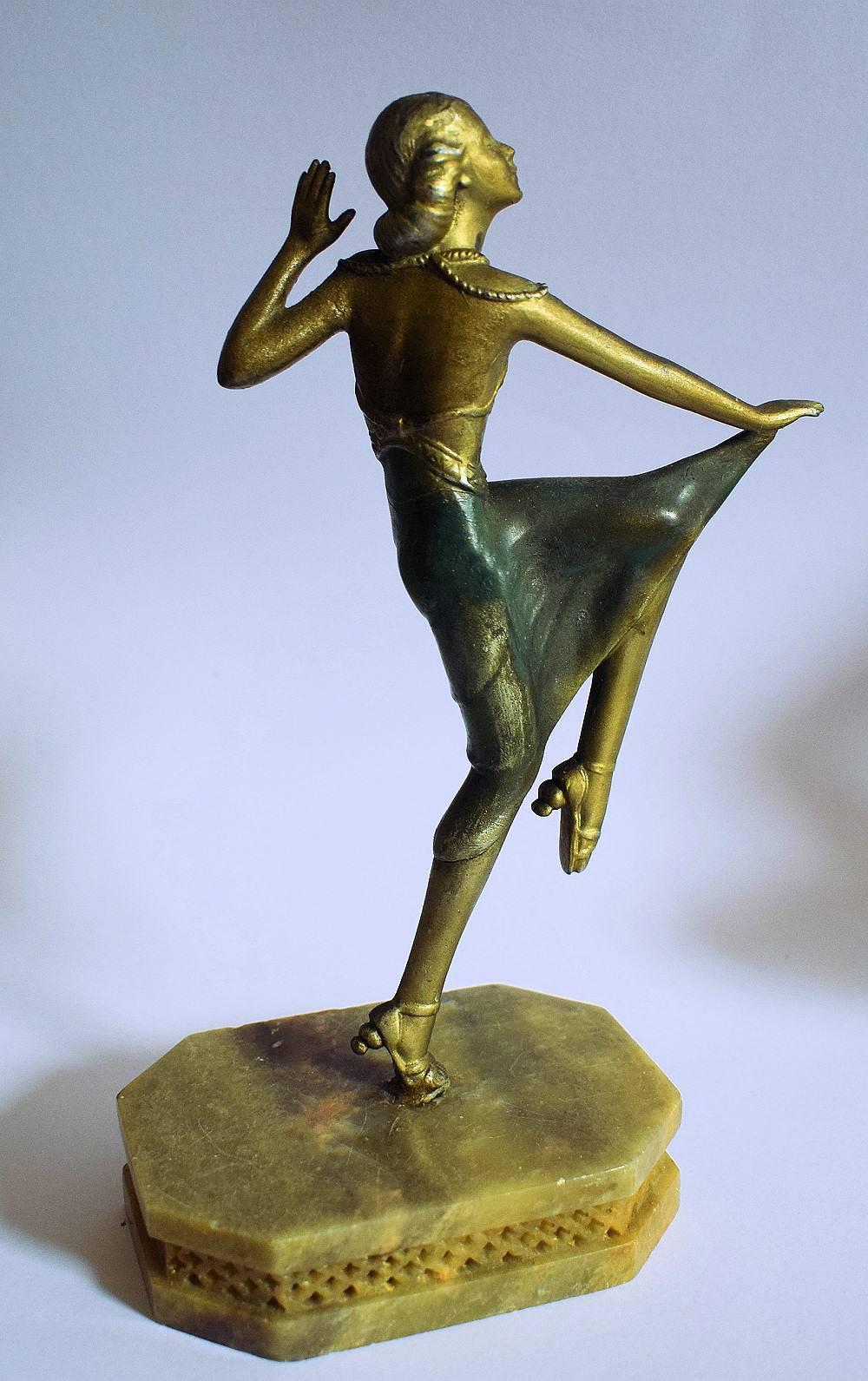 Art Deco spelter figure of a Hareem style dancing lady, finished in stunning cold painted colors. This is an original and authentic piece made and designed by Josef Lorenzl and although not signed there is no doubt what so ever as its a known piece