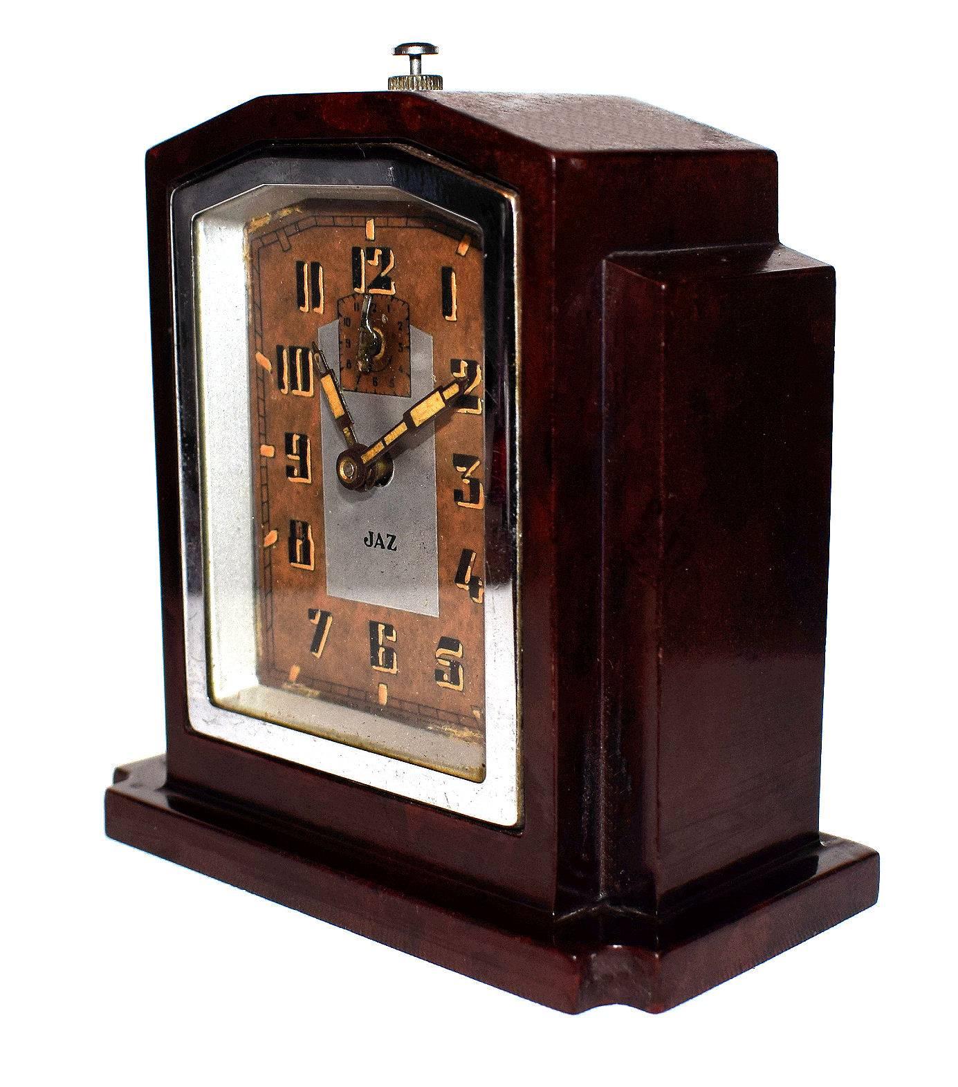 Fabulous 1930s Art Deco clock by JAZ a French clock maker. This clock is in a deep red with black speckles and wonderful skyscraper shaped casing. The condition of the face is particularly good showing little to no signs of it's true age. The