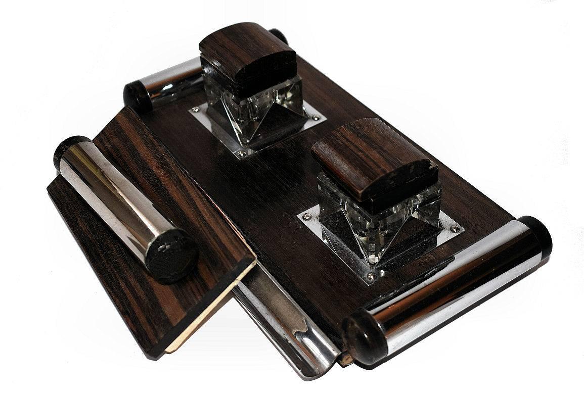 Originating from France this superb 1930s Art Deco desk set comprises a blotter and a freestanding tray which holds two inkwells, a chrome pen tray. The whole piece is adorned with chrome accents, particularly love those chrome bar handles. The