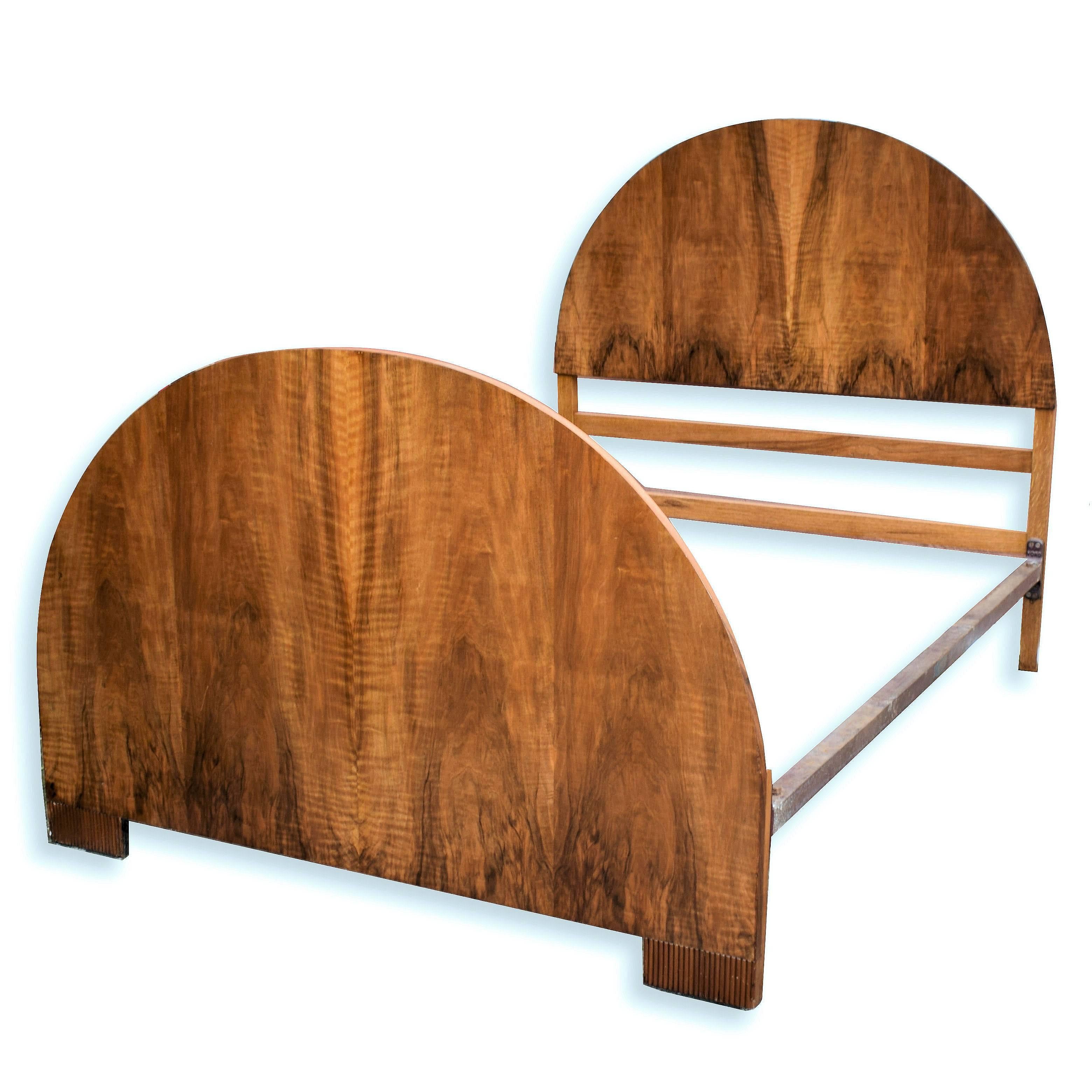 What a fabulous shape this Art Deco bed is! And such beautiful figured walnut veneers. Totally original and having been through our workshops has been fully and professionally restored. Features a huge half circle headboard and with an identical