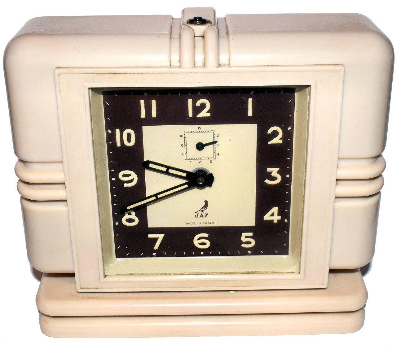 Large and rare 1930s Art Deco Bakelite wind up clock by JAZ with the most wonderful bakelite streamline case. This clock is an absolute delight. The Bakelite is an off-white cream color and is in excellent condition. The clock as with all our clocks