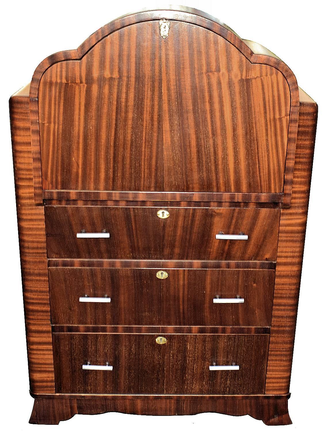 This is a fantastic 1930s Art Deco bureau of small proportions, a really superb piece of furniture. Veneered in a lovely mahogany 'Flame Grain' with three drawers to the base and a pull down top reveals a desk area with slots for envelopes and a