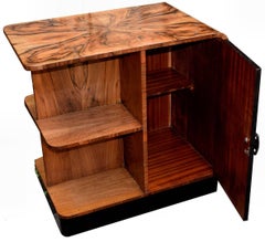 English 1930s Art Deco Heavily Figured Walnut English Book Table on Casters