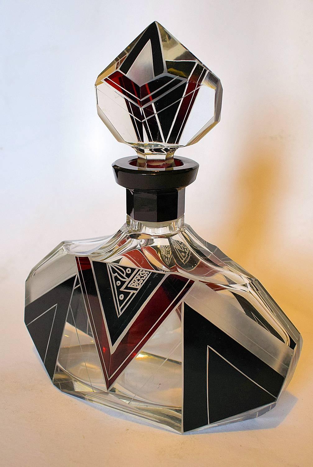 Very high quality, collectable 1930s Art Deco Czech whisky decanter set by Karl Palda. Features the Classic black geometric painted decorations to each piece. These Classic sets are rare and a beautiful addition to any Deco collection. No chips,