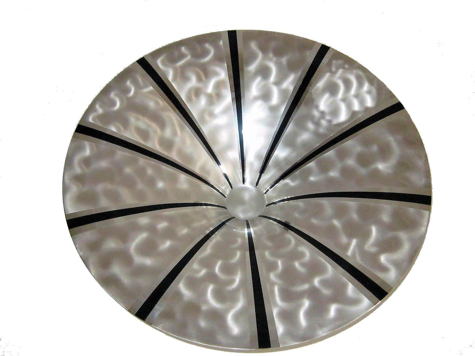 Wonderfully stylish Art Deco silver plated bowl by WMF Ikora. A shallow bowl decorated internally with black radial lines which splay outwards from the center. Underneath are three circular disc shaped feet.
Marked with impressed WMF and Ikora.