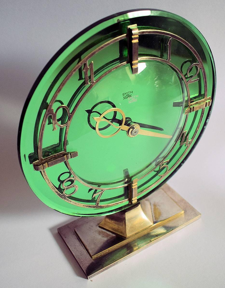 Very attractive SEC Smiths Art Deco modernist English clock. Made in England. Electric 200/250V, will need converting to work in US. Green Mirrored Background, very glamorous and finished off beautifully with a chrome dial and four chrome clips. The