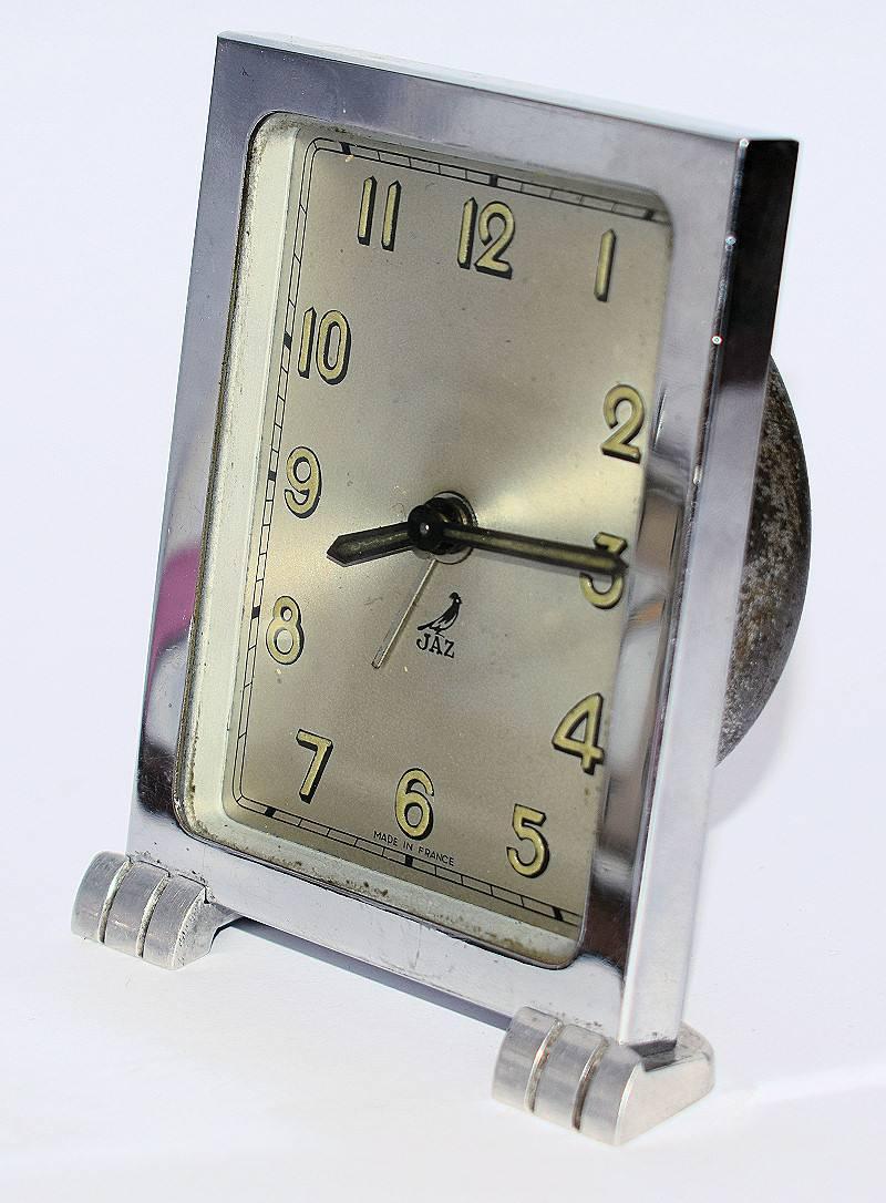 This is a lovely example of modernist chrome clock by the maker Jaz, a French company. Jaz were certainly one of the main suppliers of French Art Deco clocks to the market. This clock is a delightful size, almost miniature. Ideal for desks, bedside