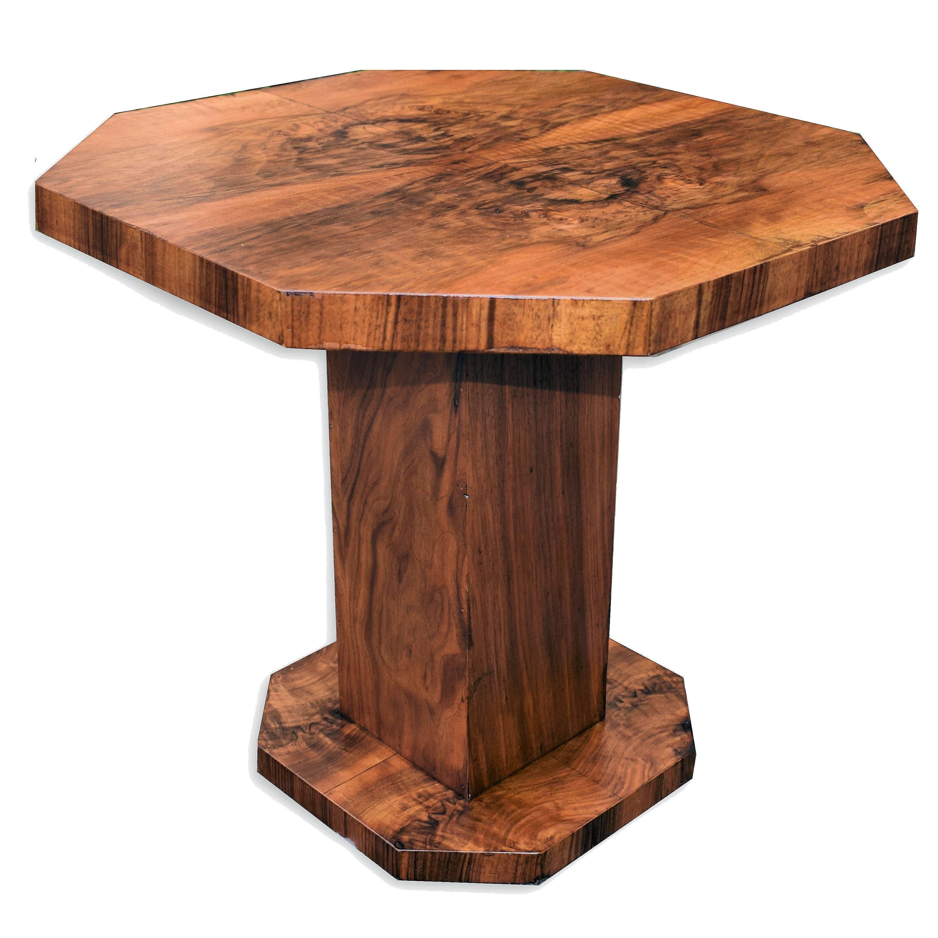 Fabulous and original 1930s Art Deco geometric occasional table. This table is ideal for modern use either as a coffee table or centre table and used as a focal point to a room. The veneers are lightly figured walnut in a mid tone colouring.