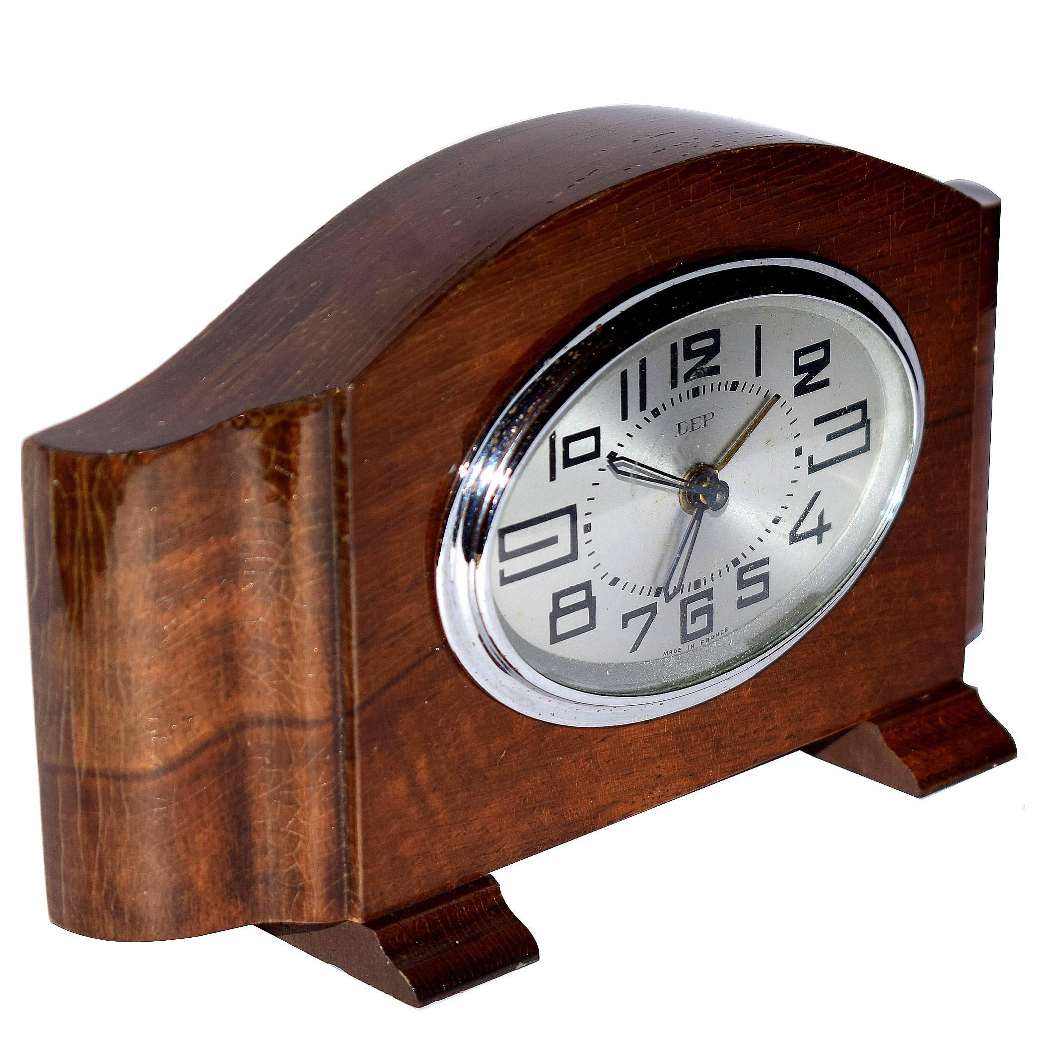 Very unusual Art Deco clock by the French clock makers Dep. We've not had one on a wooden case before, this one is our first and an absolute delight. Not only a time piece but has an alarm too. We've had this clock serviced and so comes to you in