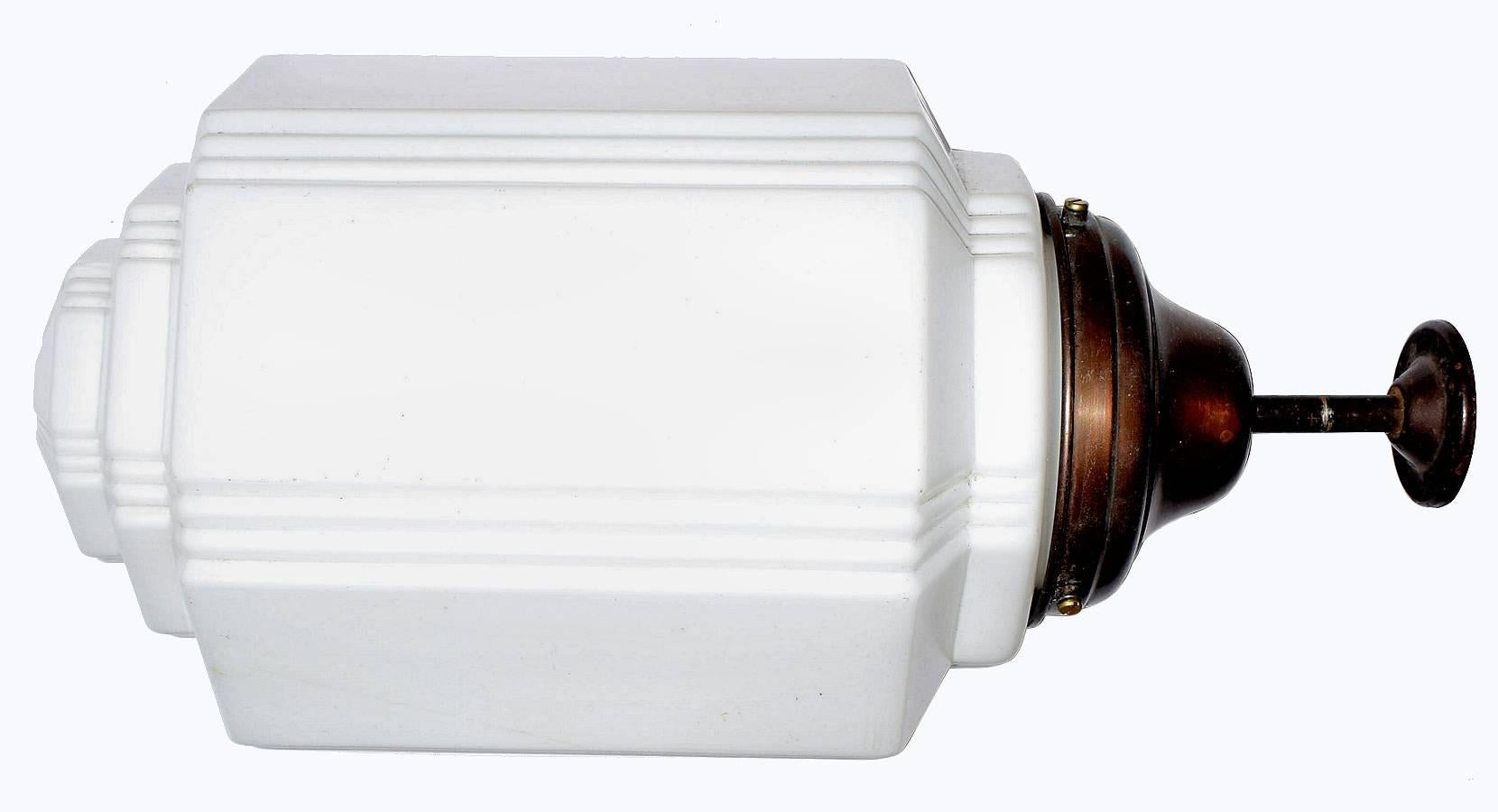 Stunning ceiling light in opaque white milk glass shade totally authentic and made in the mid-1930s. The shade is a wonderful size, impressively big making an imposing statement. The shape is reminiscent of a wedding cake, with it's stepped layers.