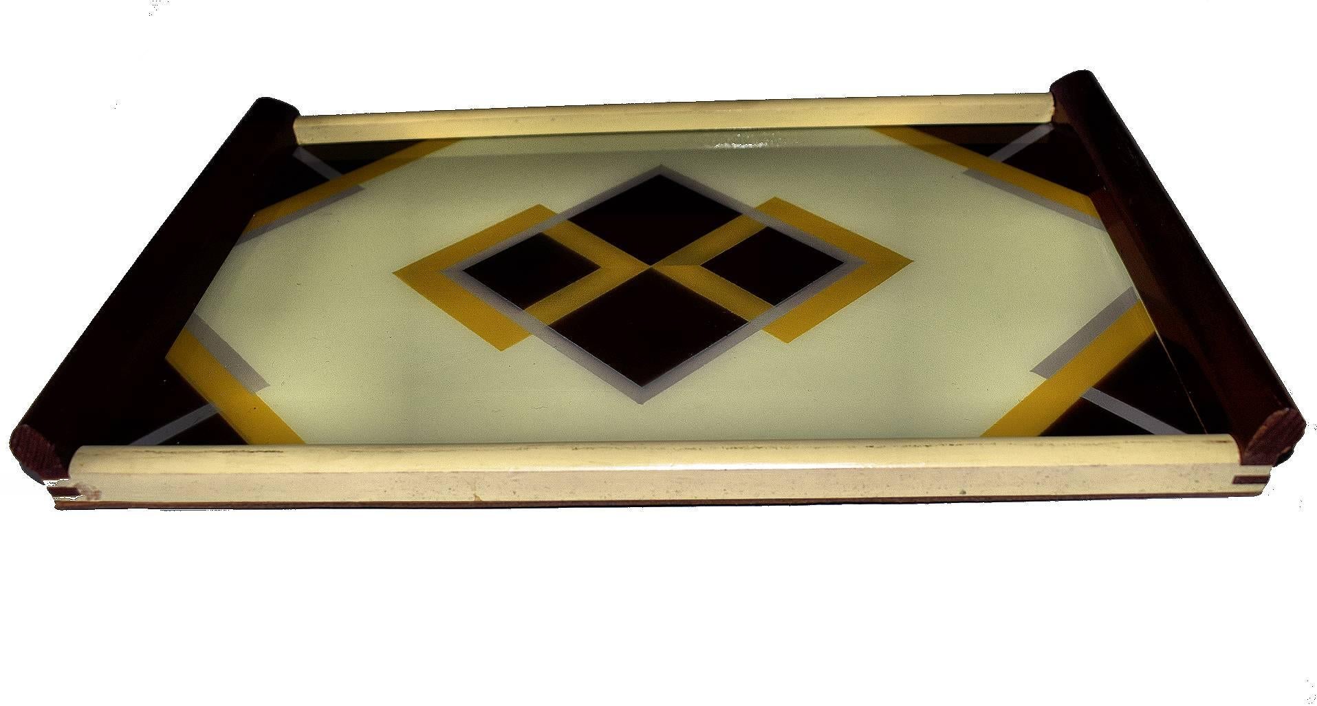 For your consideration is this original 1930s German Art Deco tray featuring a lovely reverse painted design on glass. Condition is very good. Very distinctive Deco motif. Ideal for displaying your barware or serving cocktails!