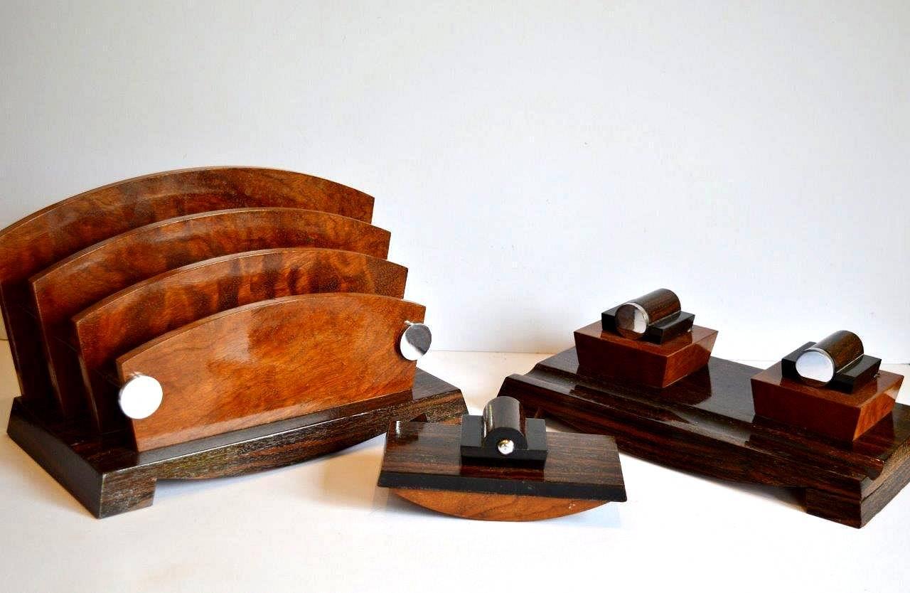 For your consideration is this wonderfully stylish 1930s Art Deco desk set in the rare woods of Walnut, ebony and Macassa. Marked to the underside for the French maker CARIMANTRAND. Each matching item is made from a beautiful combination of