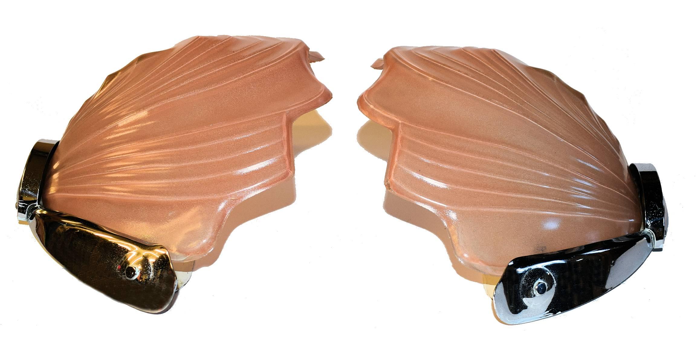 Superbly stylish matching pair of 1930s Art Deco soft salmon pink Petal Wall Lights, in excellent condition with minimal signs of age. The back plates are highly polished chrome which contrasts beautifully with the glass shades. This particular