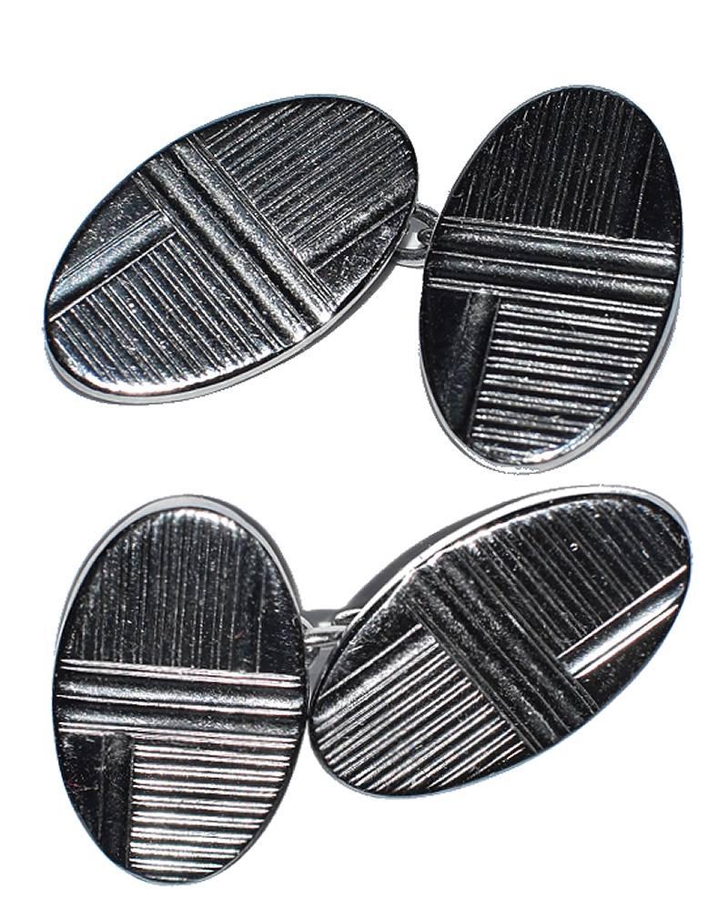 Fabulous pair of matching Art Deco men’s cufflinks with a great geometric pattern. Silver toned metal with original box, seems never to be worn. Condition is very good.