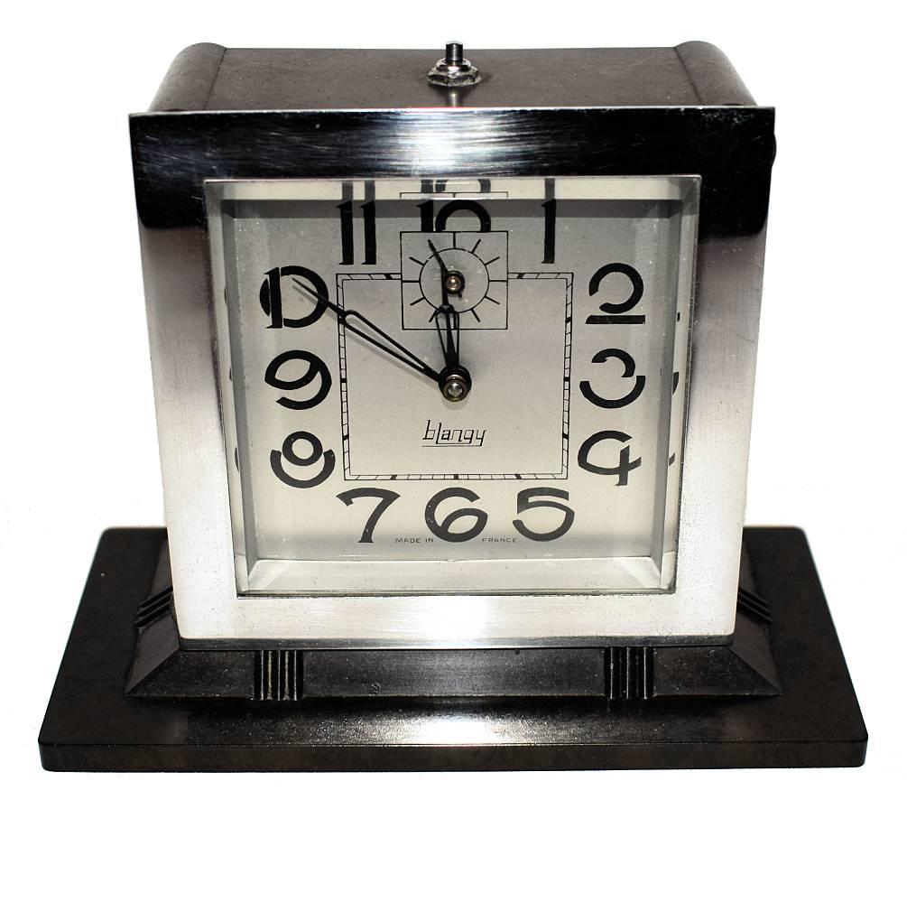 Superb 1930s Art Deco clock by the French clock company Blangy. All chrome and bakelite case which is in excellent condition and has managed to pass through the last 80 odd years without tarnishing or pitting. Very iconic numerals with unusual