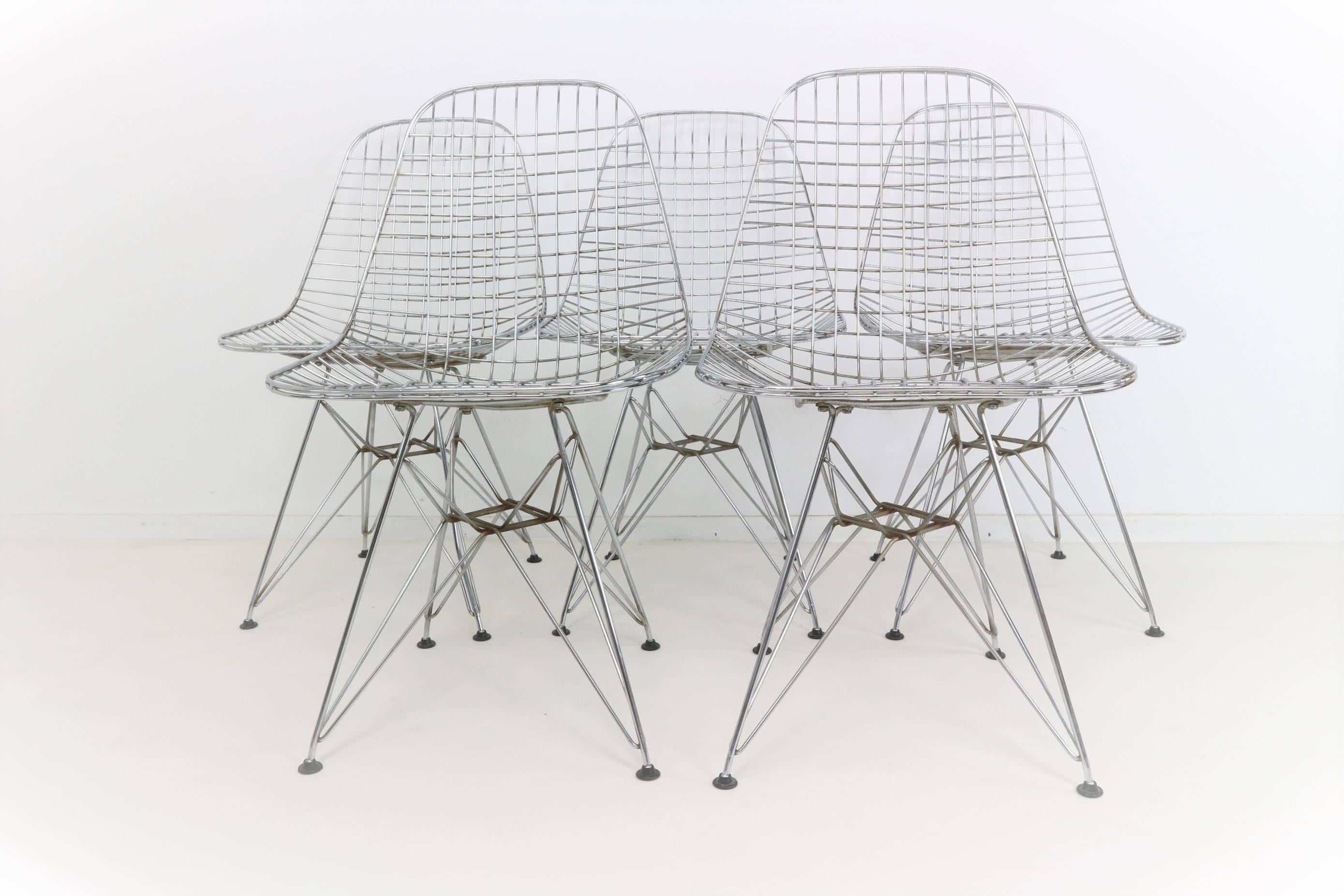 This model DKR-2 chair was designed in the 1950s by Ray & Charles Eames for Herman Miller and produced by Vitra. It is made from chrome-plated steel wire with a four-legged steel base known as an Eiffel Tower base.