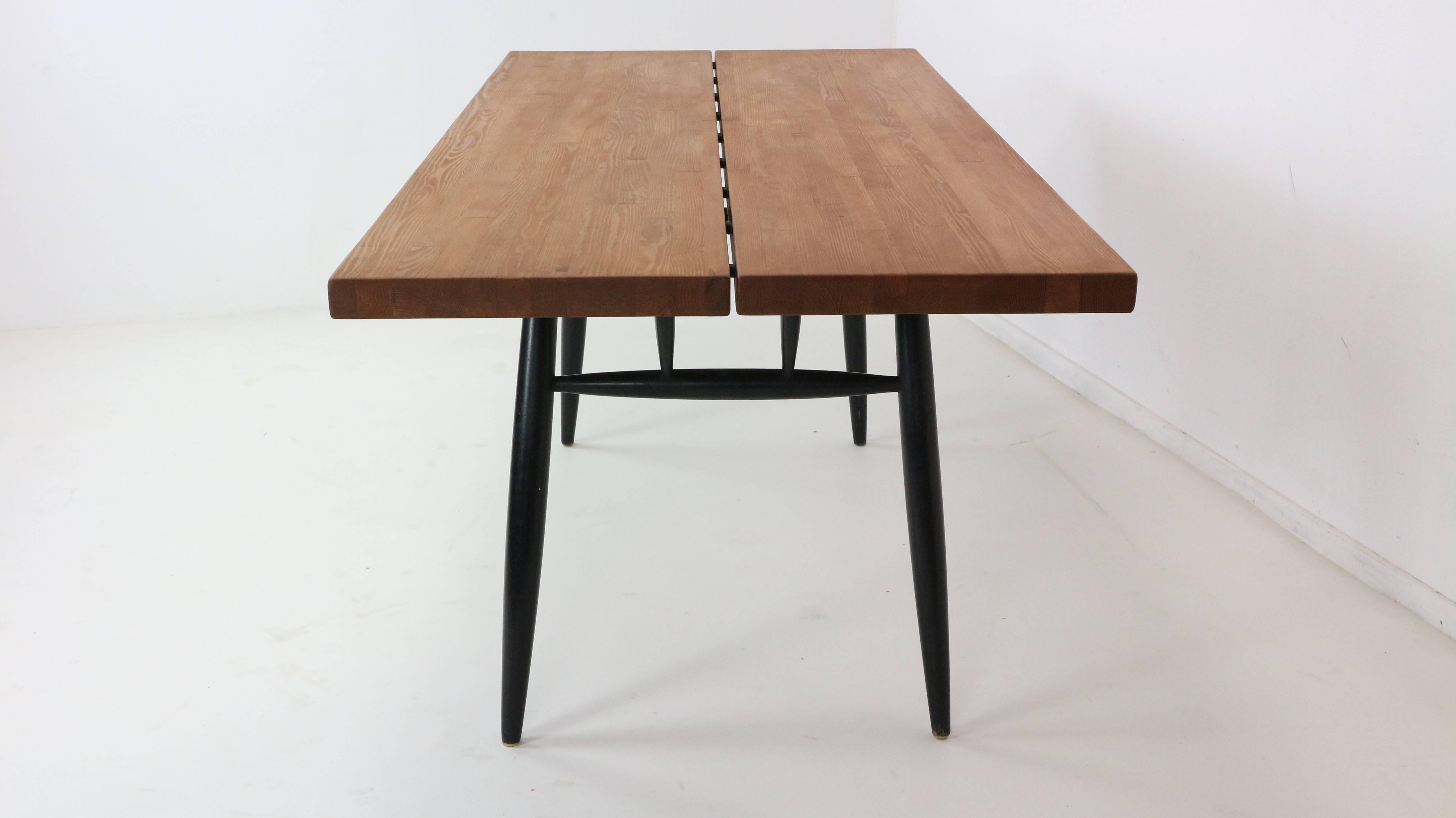 The largest of the Pirkka series dining tables by Ilmari Tapiovaara for Laukaan Puu, Finland, 1950s
Designed using highest quality pine wood with black lacquer base, giving it an eye-catching and highly recognizable appearance. This set is a truly