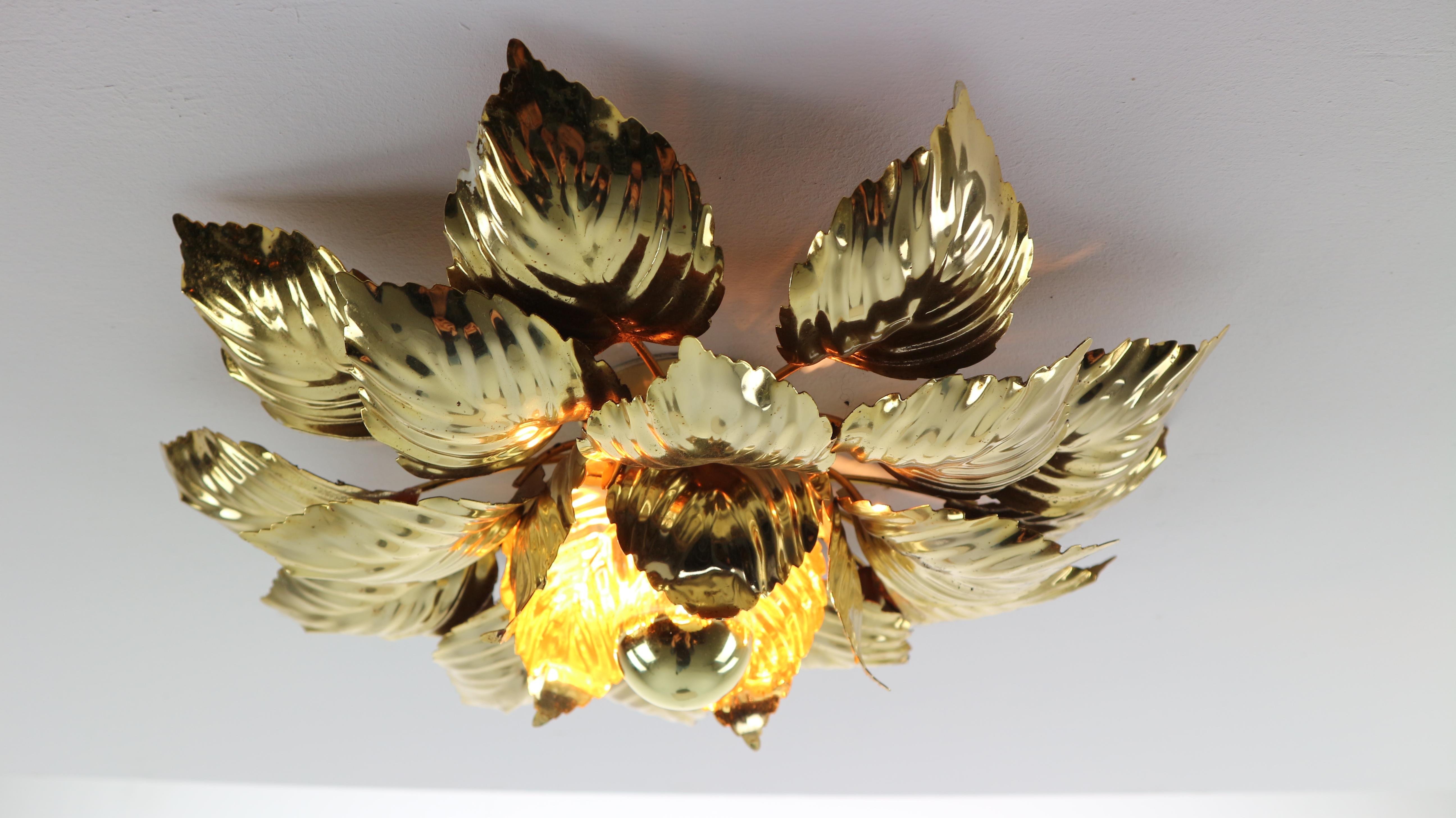 Vintage Mid-Century Modern, Willy Daro brass wall or ceiling light with brass leave ornaments made in 1970s.
Gives beautiful, elegant and warm lightening.
 