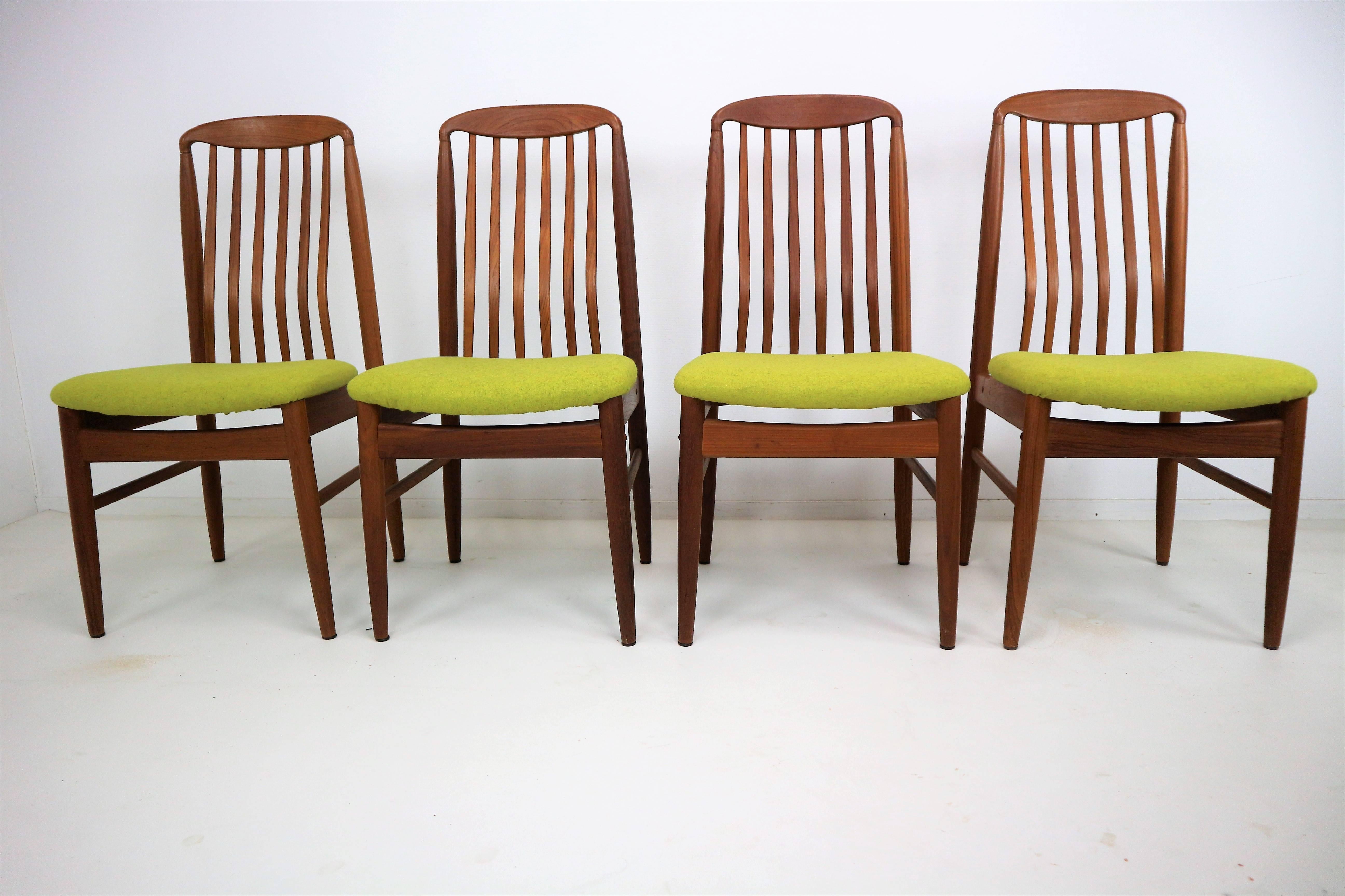 Set of four vintage Benny Linden teak dining chairs. Danish modern design, made in Thailand. Quality construction with graceful styling. Lines are beautifully contoured with the gentle curves. Contoured spindles lend ergonomic support to the back.