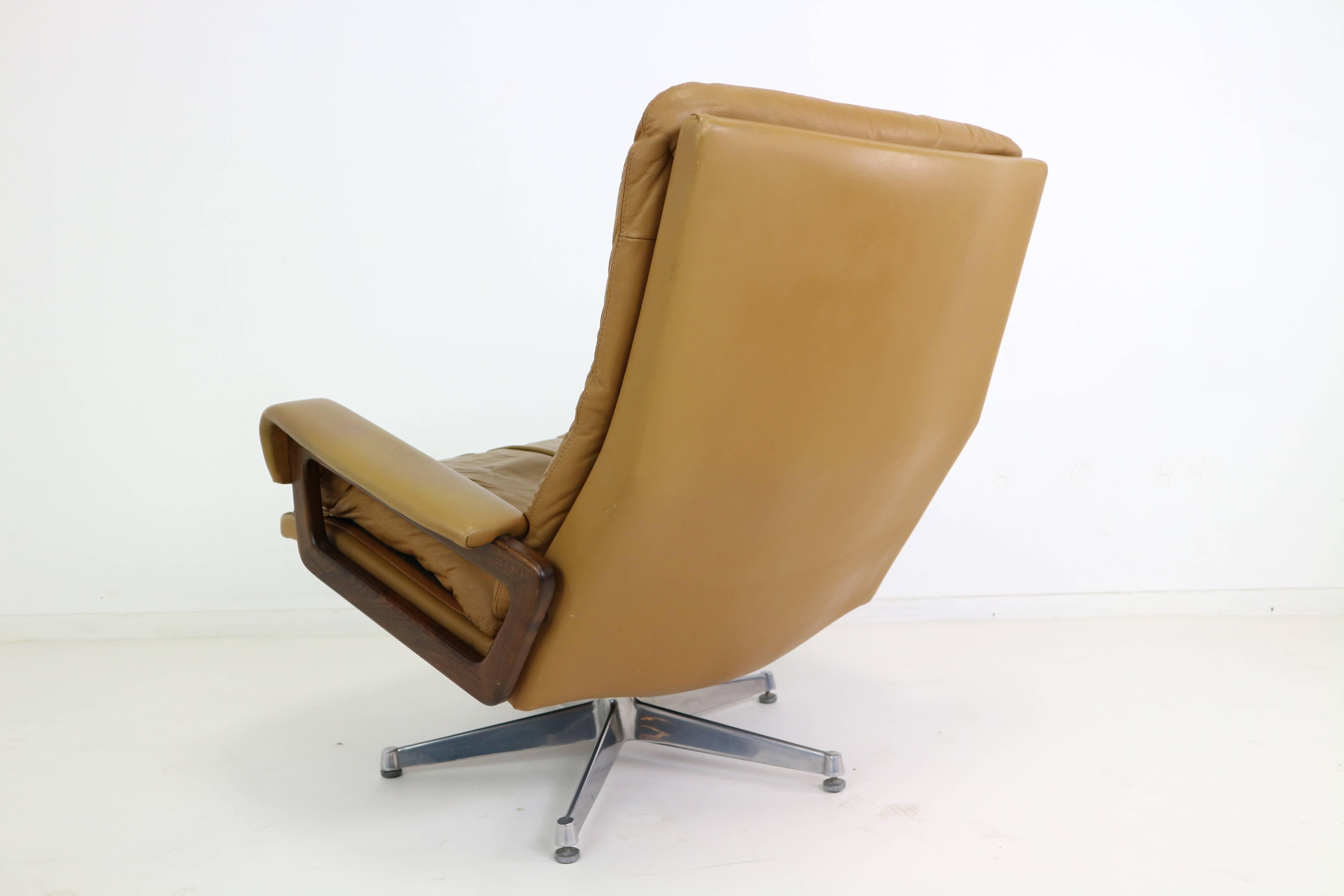 Mid-Century Modern Strassle King Swivel Chair and Ottoman in Cognac Leather by Andre Vandenbeuck