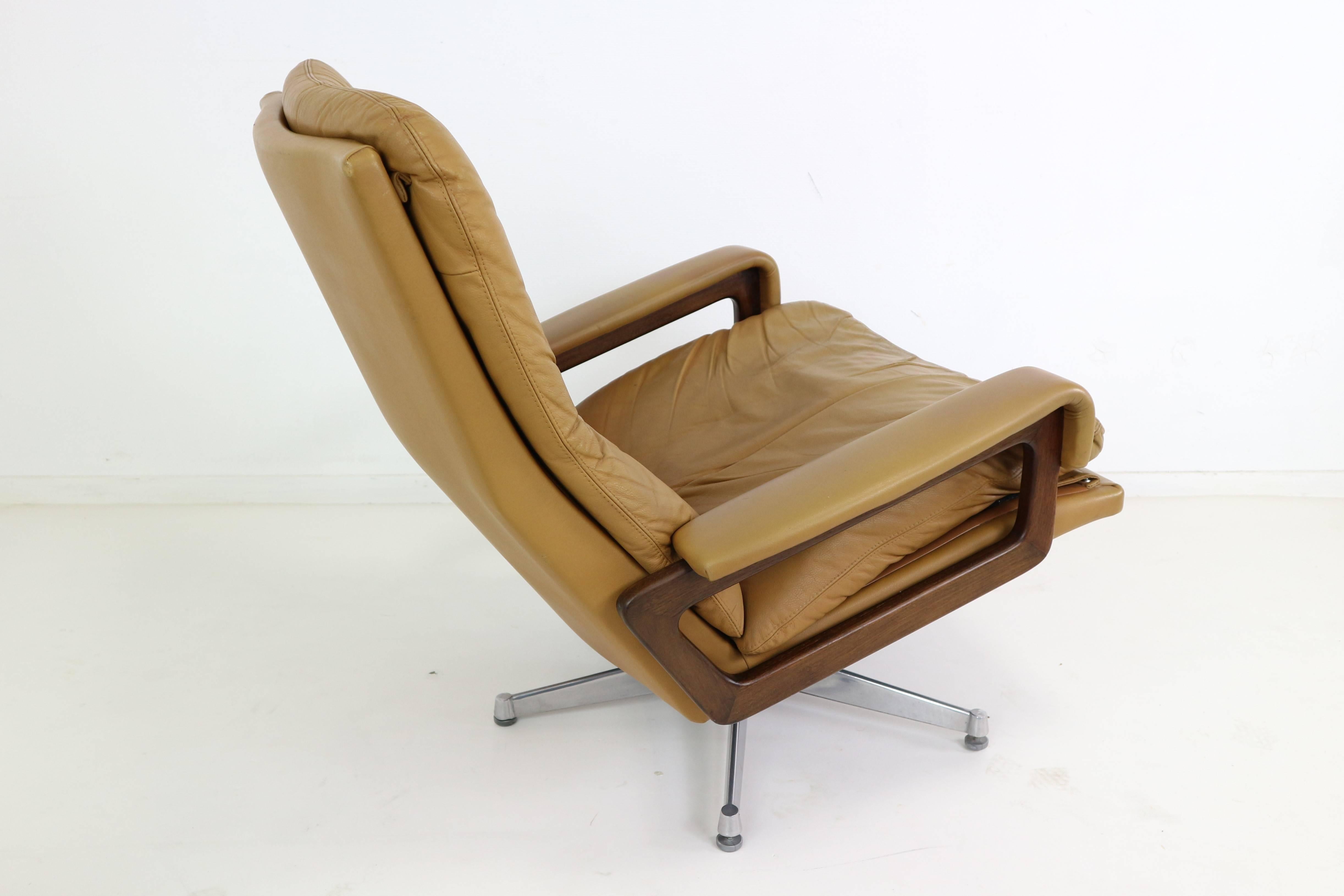 Swiss Strassle King Swivel Chair and Ottoman in Cognac Leather by Andre Vandenbeuck