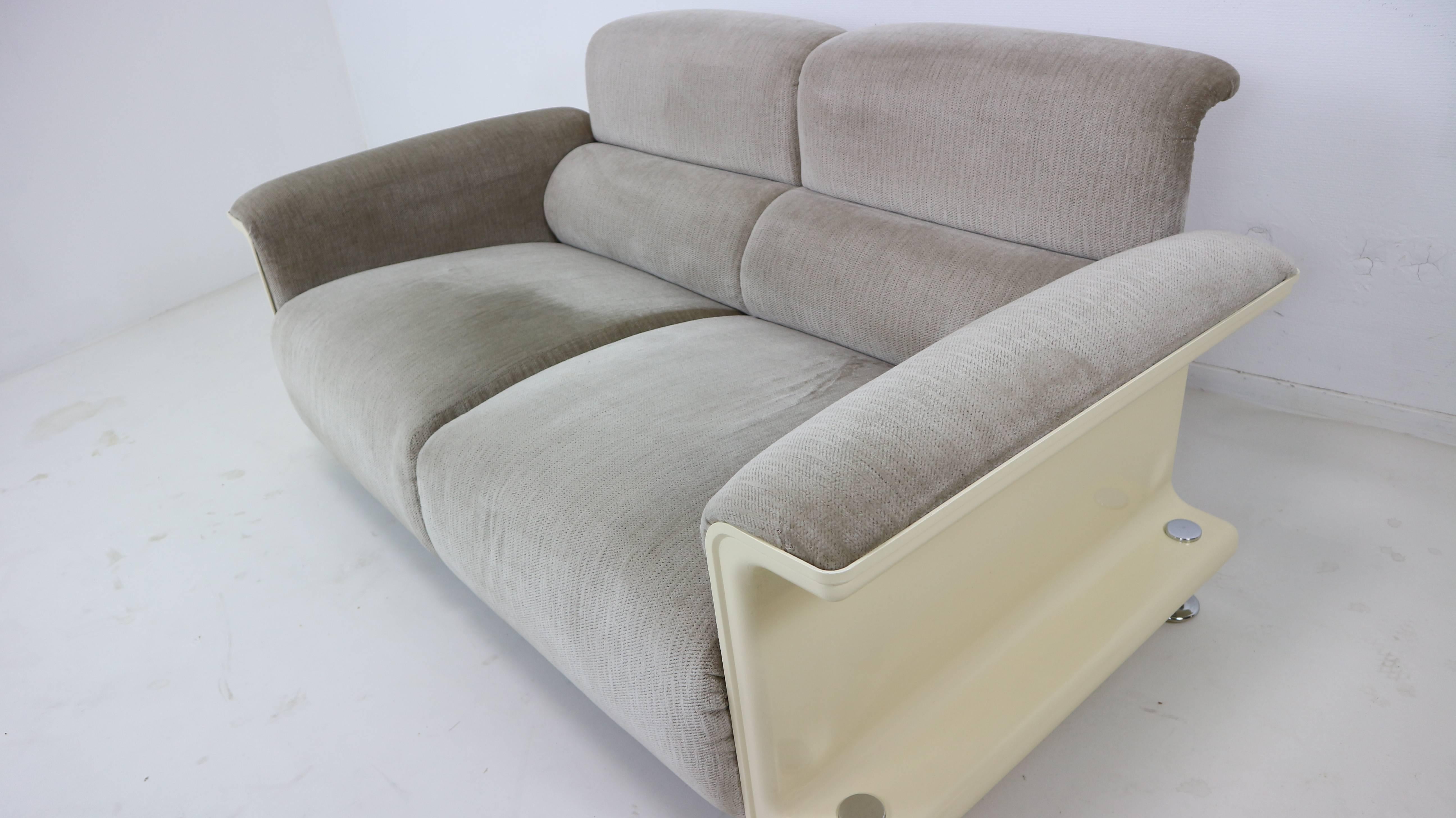 Beautifully designed two-seat sofa from the 1970s, made in the Netherlands. The shell is made from a hot-pressed sheet molding compound and its covered with a light gray velvet upholstery. 

 

 