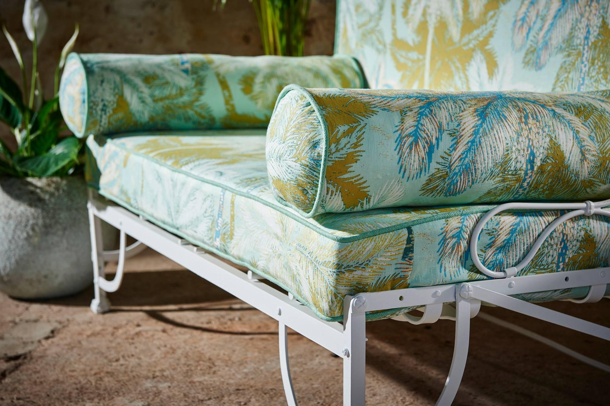 A beautiful retro 1960s daybed, perfect for the conservatory or garden room.

This chic French daybed is so comfortable, and is light enough to be easily moved between garden and indoors. We've added new fireproof cushioning, upholstered with a