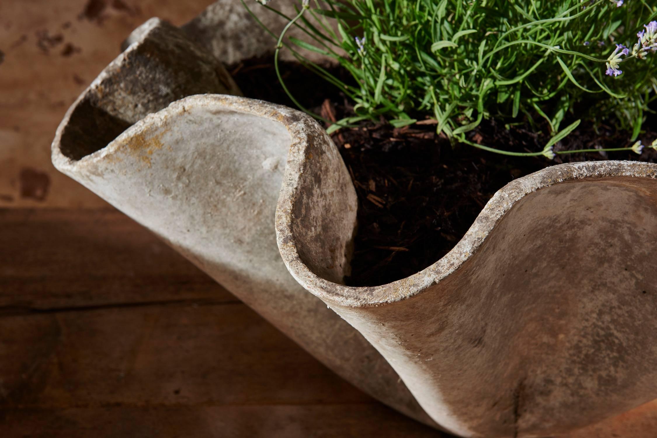 These three planters are made from lightweight composite cement, and have the Classic, free-form 