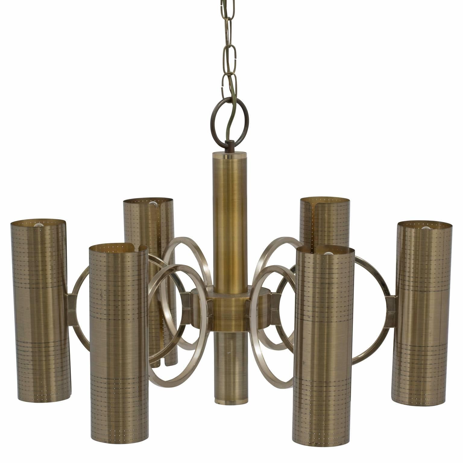 High-impact lacquered burnished brass chandelier with perforated, pin-pricked cylinder lamps held by chrome rings, designed by Gaetano Sciolari. It has a modern machine-age vibe. Six upward and six downward lights. Chandelier has been rewired in the