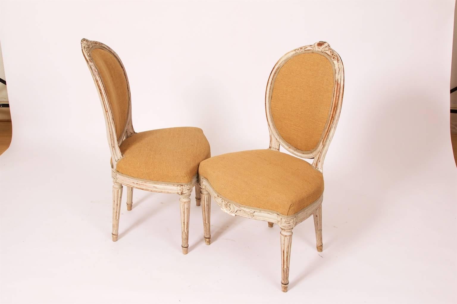 A pair of Georges Jacob chairs, Paris, France, Louis XVI-style, wooden stamped (see images), circa 1765-1775. Dry scraped to original color and retouched
