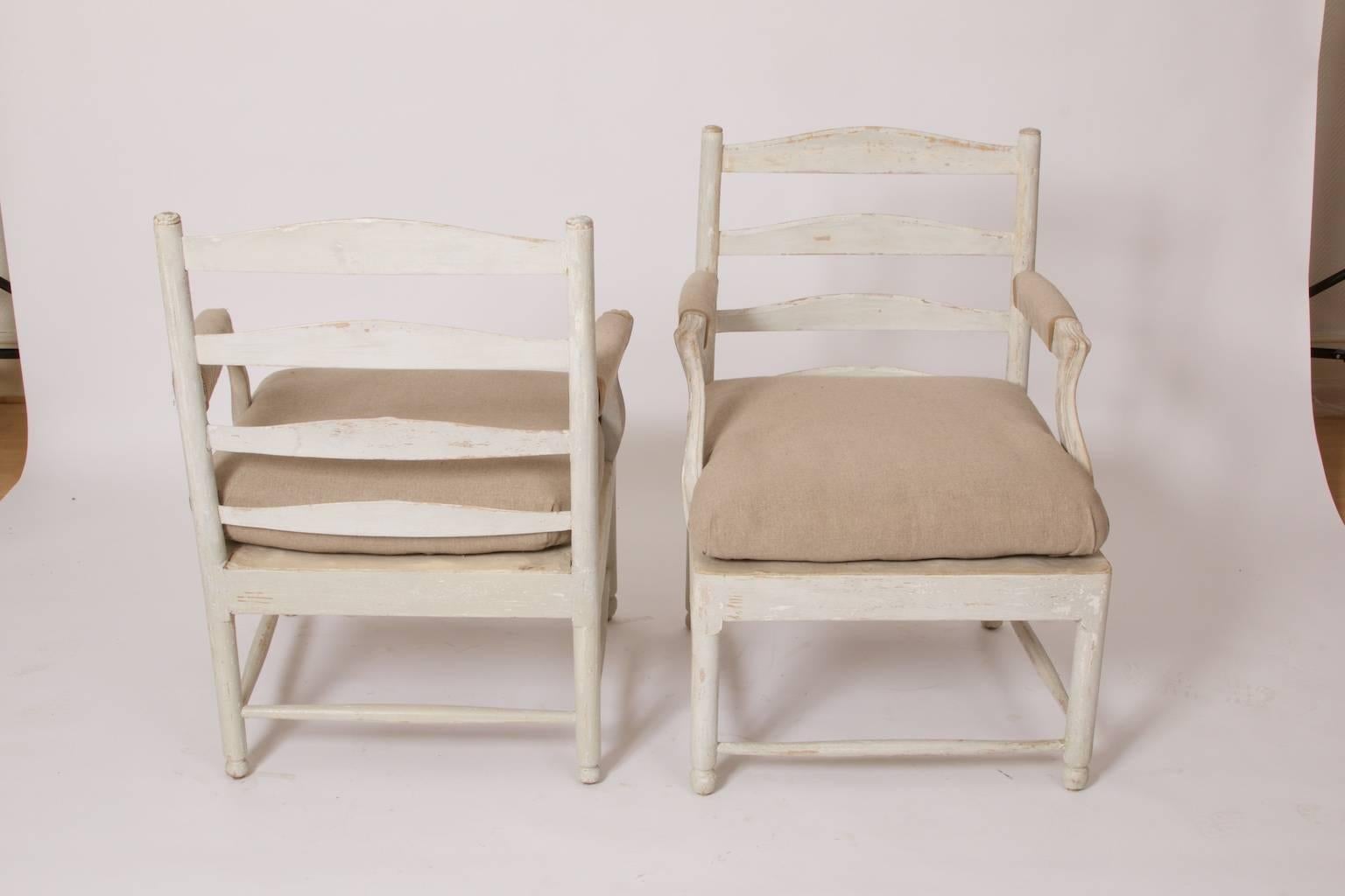 A pair of armchairs, Gripsholm, Sweden, circa 1790.
Dry scraped to original color and retouched.

This beautiful armchair called Gripsholm named after the royal castle with the same name located outside Stockholm at lake Mälaren. King s Gustav
