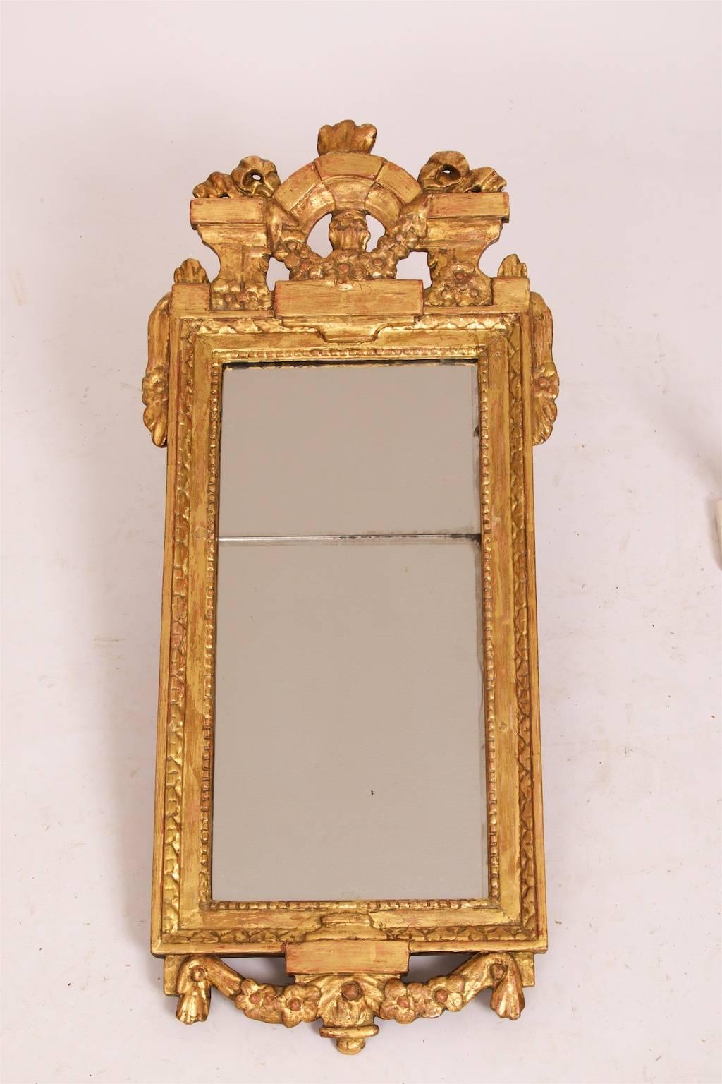 A beautiful Gustavian pair of quite similar guilded mirrors, one signed by Johan Åkerblad (stamped IÅ, see the images), Stockholm, Sweden 1780. The mirrors are  hand carved in wood. Plaster and guilded. 

The size is not to big and not to small but