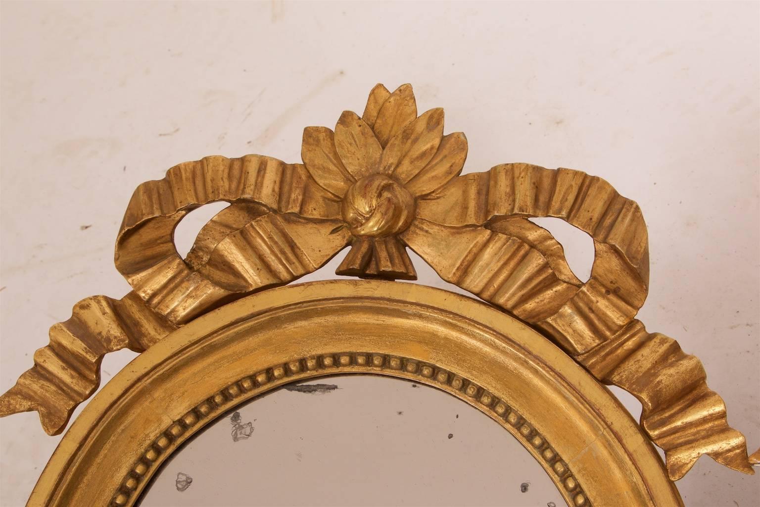 Pair of Gustavian Medallion Mirror Sconces, circa 1790, Sweden In Good Condition For Sale In Malmo, SE