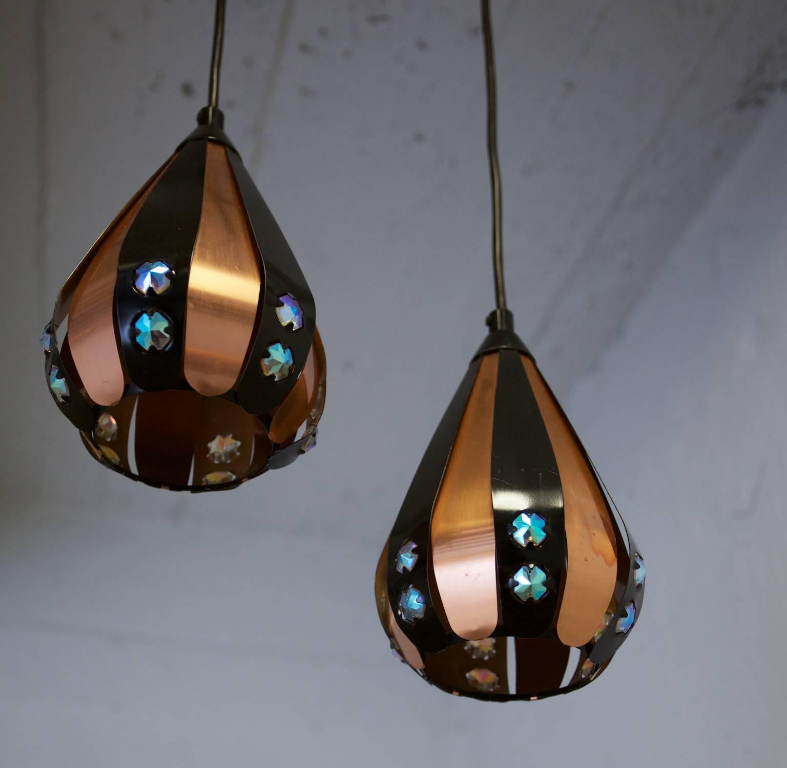 These very cool pendants in copper and black, decorated with prisms by Werner Schou for Coronell Elektro, 1960s-1970s, Denmark. This small pendants where often placed in windows and connected to a wall outlet. "Werner Schou, (Werner Hugo August