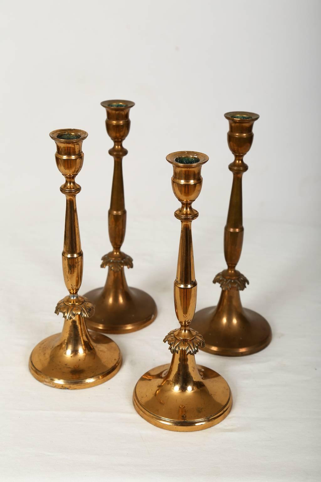 A unique set of four Swedish Empire brass candle holders, circa 1830.
One of the pairs is polished to higher gloss as seen in the image.
