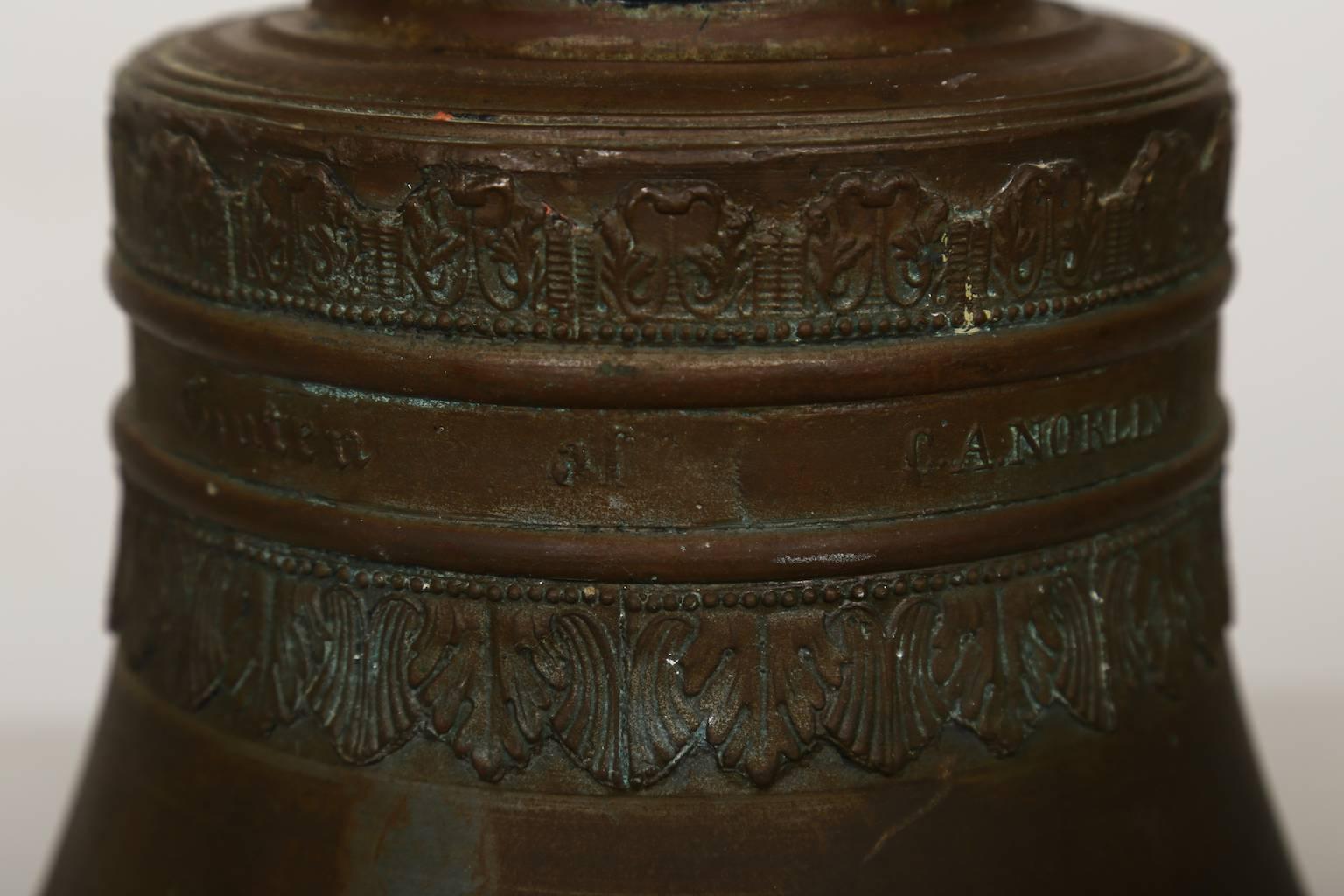 Brass farm bell late 19th century. Cast by C. A. Norling, Jönköping/Husqvarna Sweden as can be seen in images. Measure: 32 centimeters in height and 33.5 i diameter.
With the text in relief: Gjuten af C.A. Norling (translated Cast by C.A. Norling).