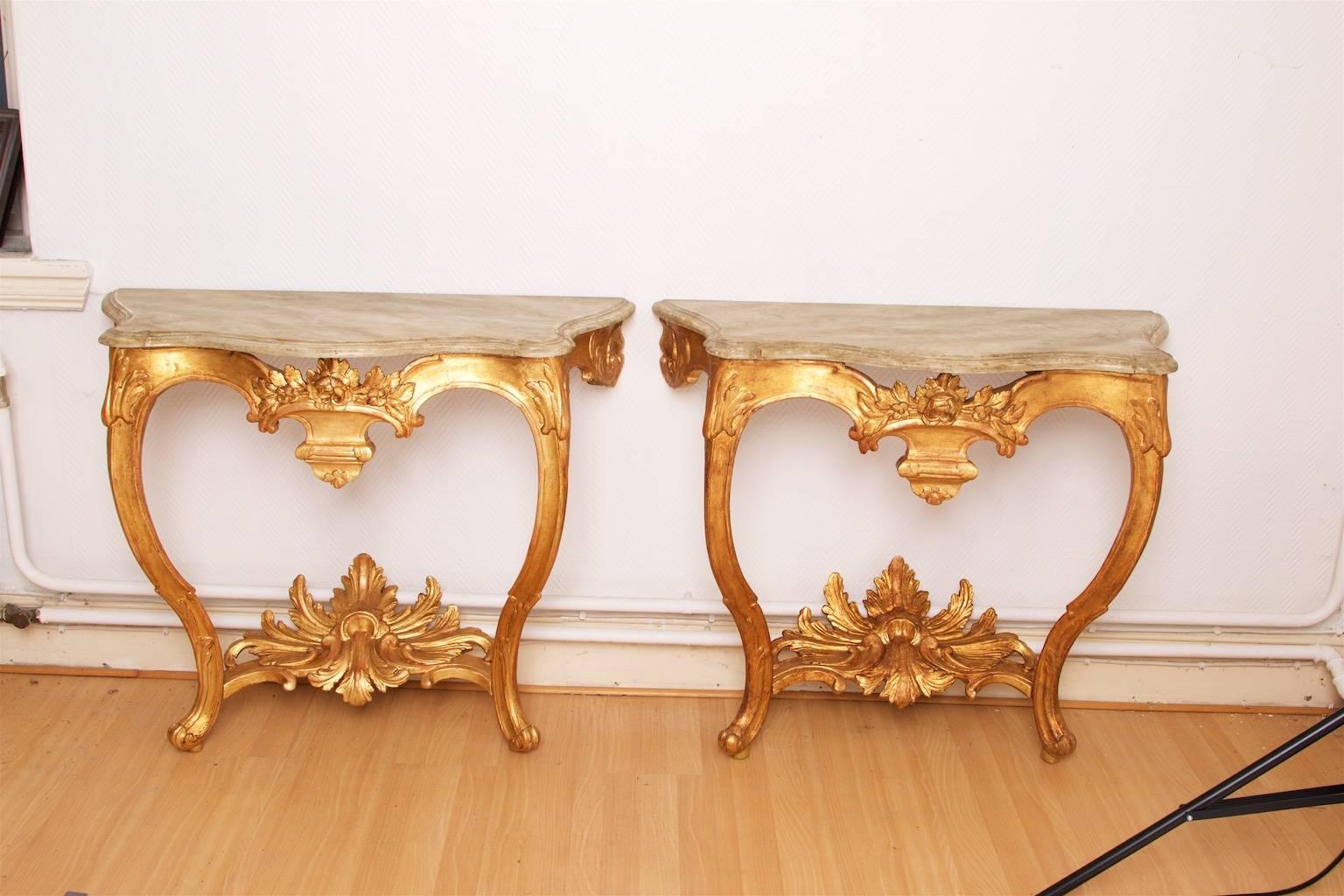 Console table. A pair, quite similar, circa 1770, Stockholm. Flodins art. Wooden table top. 